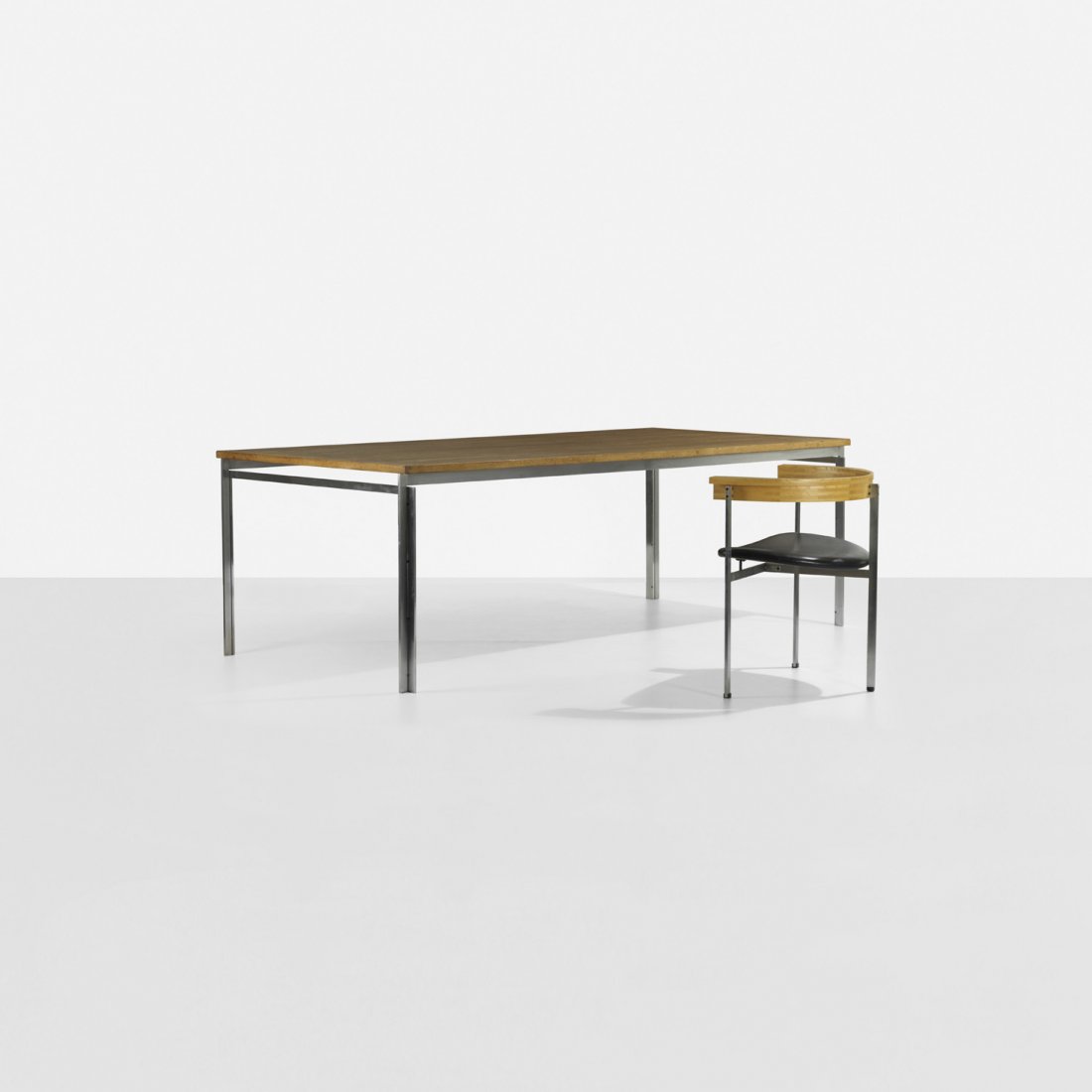 Poul Kjaerholm PK 55 dining table and PK 11 chair: Poul Kjaerholm PK 55 dining table and PK 11 chair E. Kold Christensen/Fritz Hansen Denmark, 1957/1985 oak, matte chrome-plated steel, leather, plastic 80.25 w x 40 d x 27 h inches Chair measures: 25 w