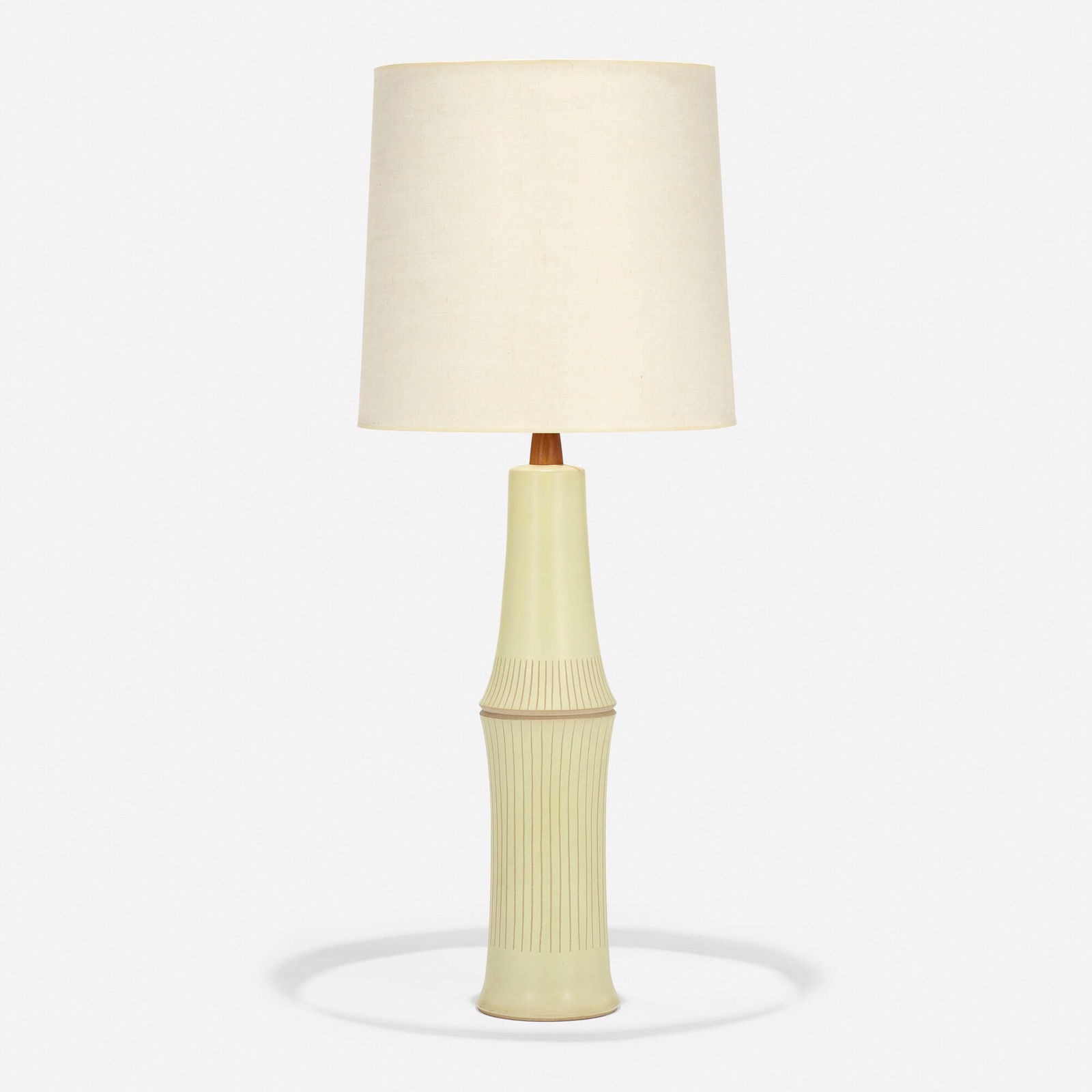 Gordon and Jane Martz, Table lamp: Gordon and Jane Martz Table lamp USA, c. 1955glazed earthenware, walnut, linen shade, brass 44 h x 18.75 dia in (112 x 48 cm) Incised signature to reverse of base 'Martz'.