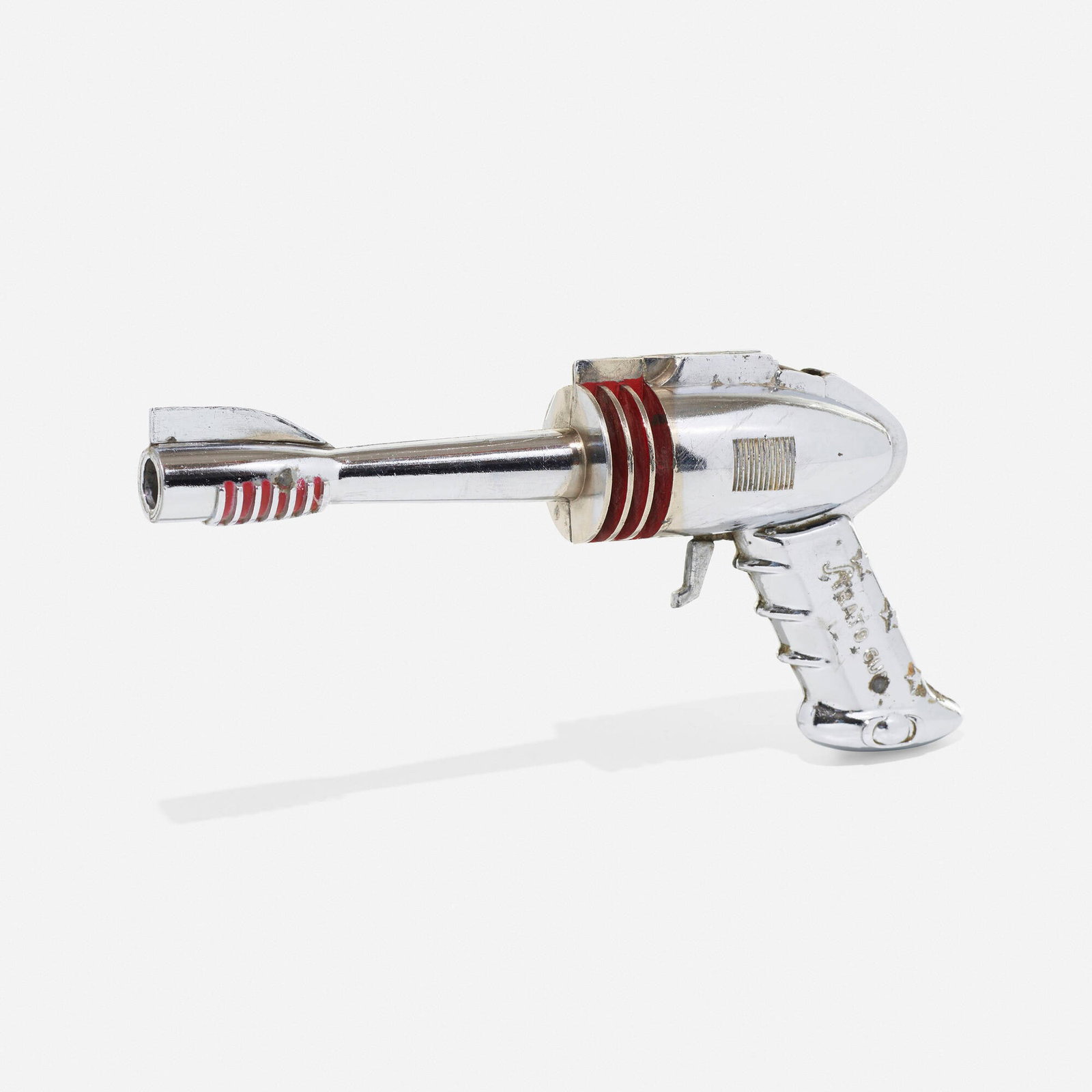 Futuristic Products Company, Strato gun: Futuristic Products Company Strato gun Futuristic Products Co. USA, 1953 aluminum 4 h x 9 w x 1.5 d in (10 x 23 x 4 cm) Cast manufacturer's mark to handle 'Strato Gun'.