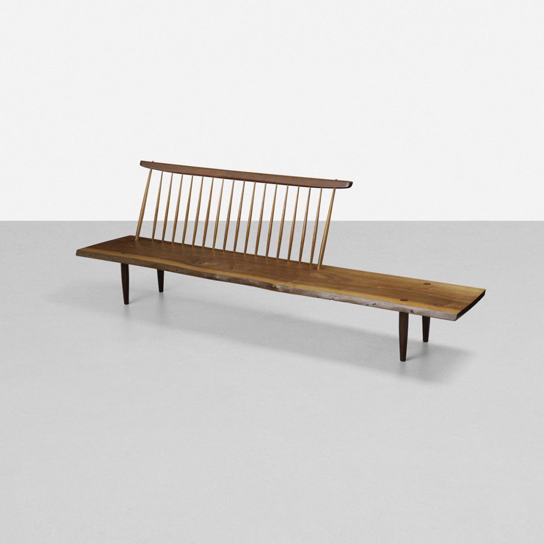 George Nakashima Important Bench with Back: George Nakashima Important Bench with Back USA, 1958 American black walnut, hickory 96 w x 24 d x 31.25 h inches Solid, single slab seat with free edge, knots and sap grain details. Sold with original