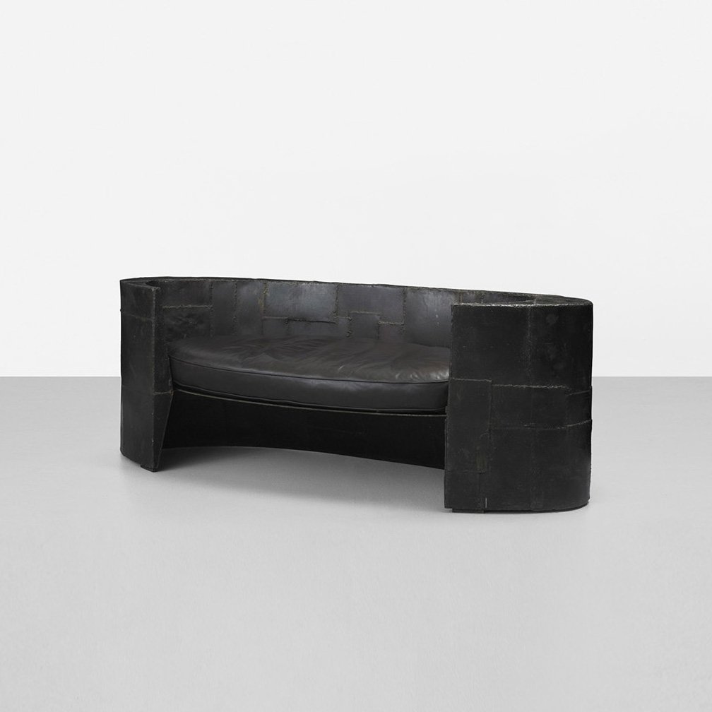 Paul Evans unique sofa: Paul Evans unique sofa Paul Evans Studio USA, c. 1970 welded and patinated steel, leather 83 w x 27 d x 30 h inches Provenance: Suzanne Lipschutz, Secondhand Rose, New York | Robert Isabell, New York