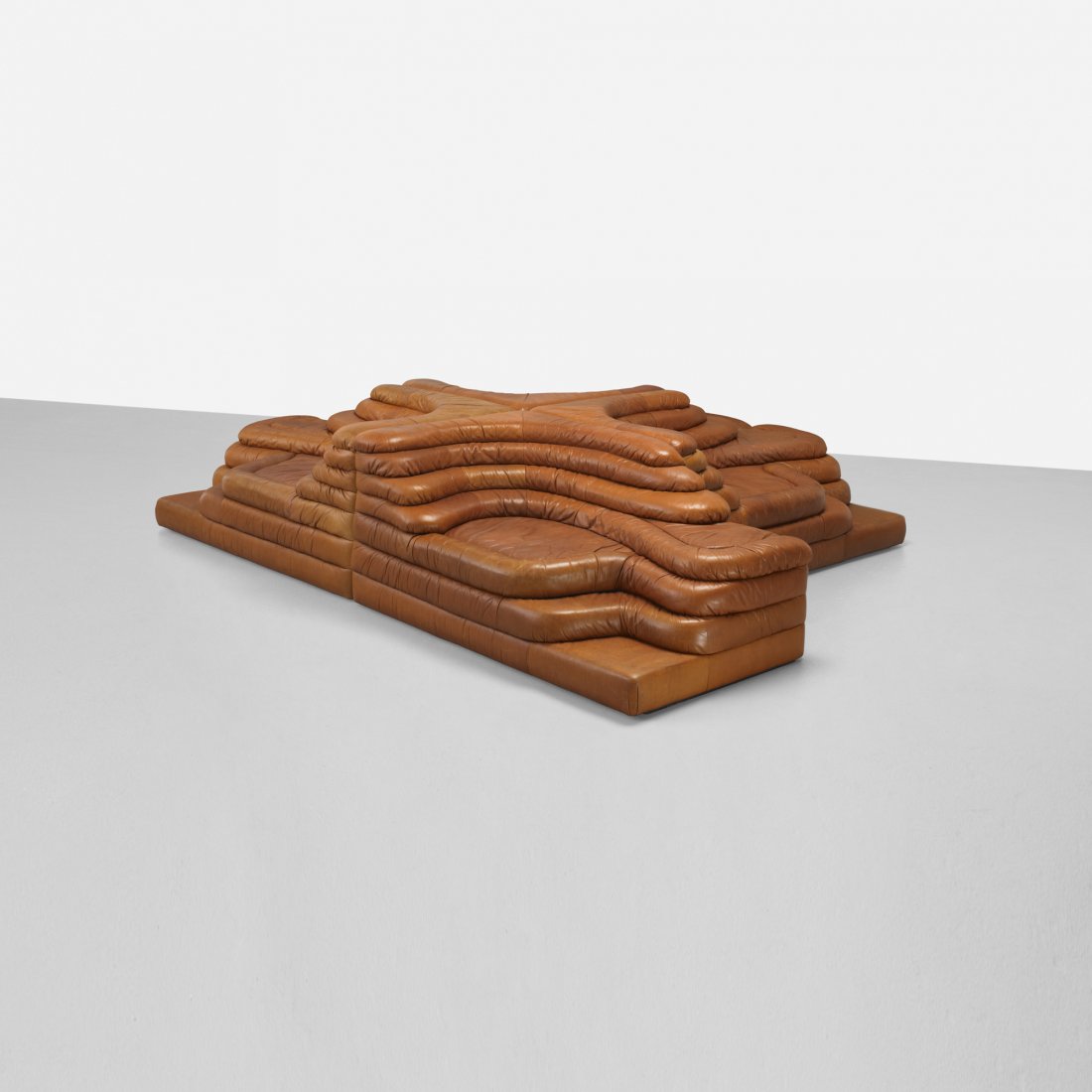 Ubald Klug Terrazza Furniture System: Ubald Klug Terrazza Furniture System De Sede Switzerland, 1973 leather over foam and plywood 122 w x 66 d x 26.75 h inches Signed with paper distributor's label to underside: [Sold by Stendig, Inc. 41