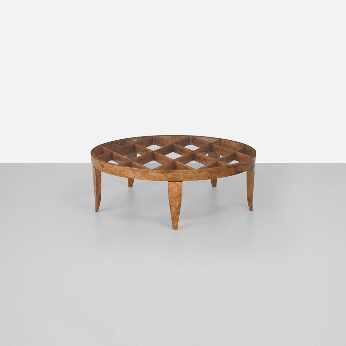 Gio Ponti rare coffee table: Gio Ponti rare coffee table Giordano Chiesa Italy, c. 1935 olivewood, glass 51.75 dia x 17.5 h inches Sold with a certificate of expertise from the Gio Ponti Archives. Literature: Gio Ponti: L'Arte Si