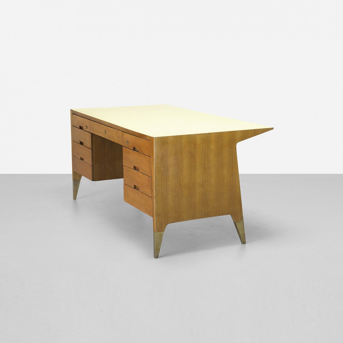 Gio Ponti executive desk from Vembi-Burroughs, Gen: Gio Ponti executive desk from Vembi-Burroughs, Genoa Giordano Chiesa Italy, 1950 ash, laminate, brass 71 w x 35.5 d x 31.25 h inches Literature: Gio Ponti: L'Arte Si Innamora Dell'Industria, La Pietra