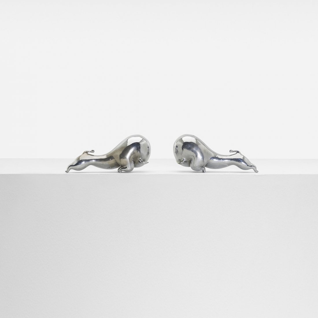 Russel Wright Rodeo Circus bookends, pair: Russel Wright Rodeo Circus bookends, pair Russel Wright, Inc. USA, c. 1930 chrome-plated brass 8.5 w x 2.5 d x 3.75 h inches Literature: Collector's Encyclopedia of Russel Wright, second edition, Ker