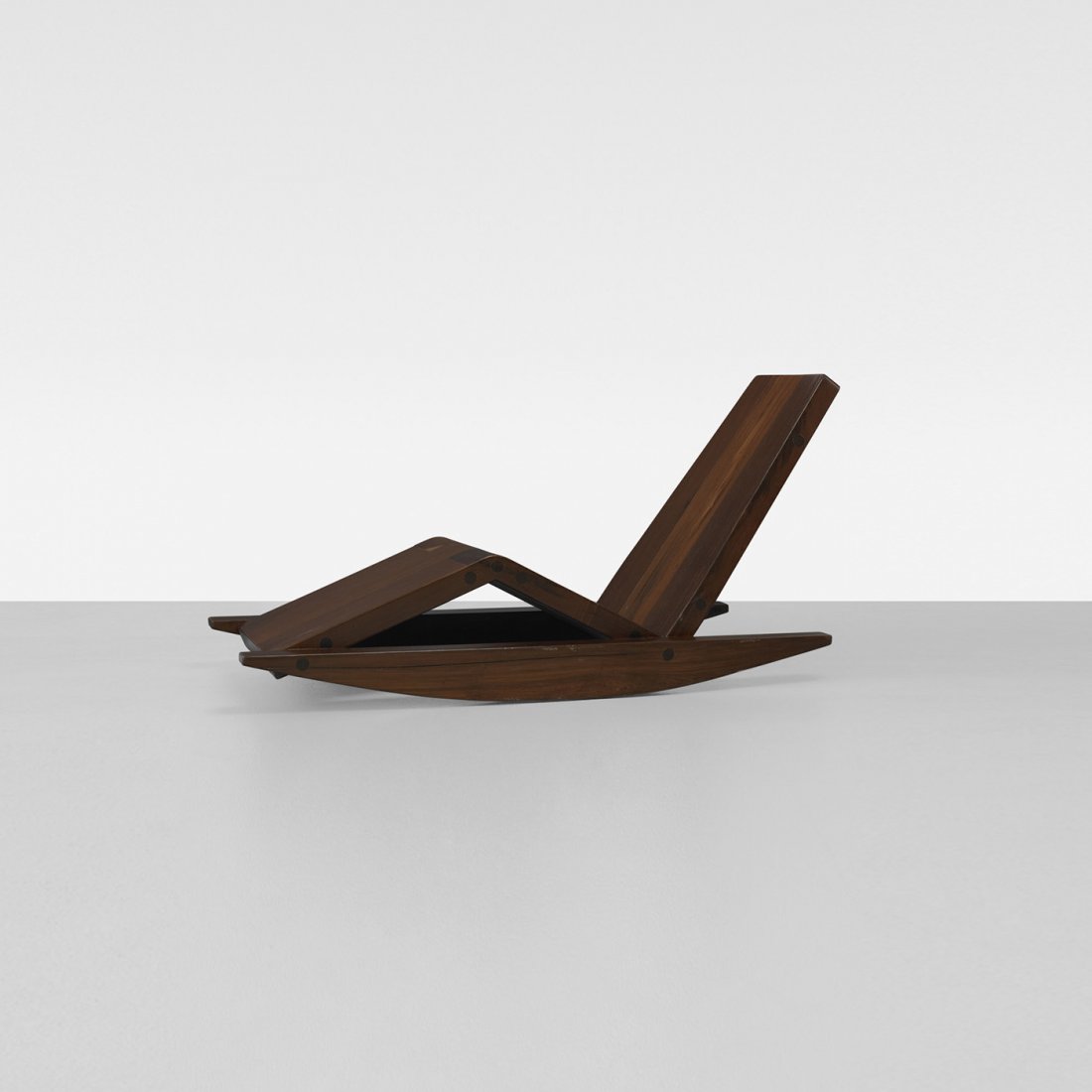 Zanini de Zanine Caldas rocking lounge chair: Zanini de Zanine Caldas rocking lounge chair Brazil, 2010 solid reclaimed Ipê 28.75 w x 65 d x 32 h inches This work is number one from the edition of four. Signed with impressed number and date: [1/