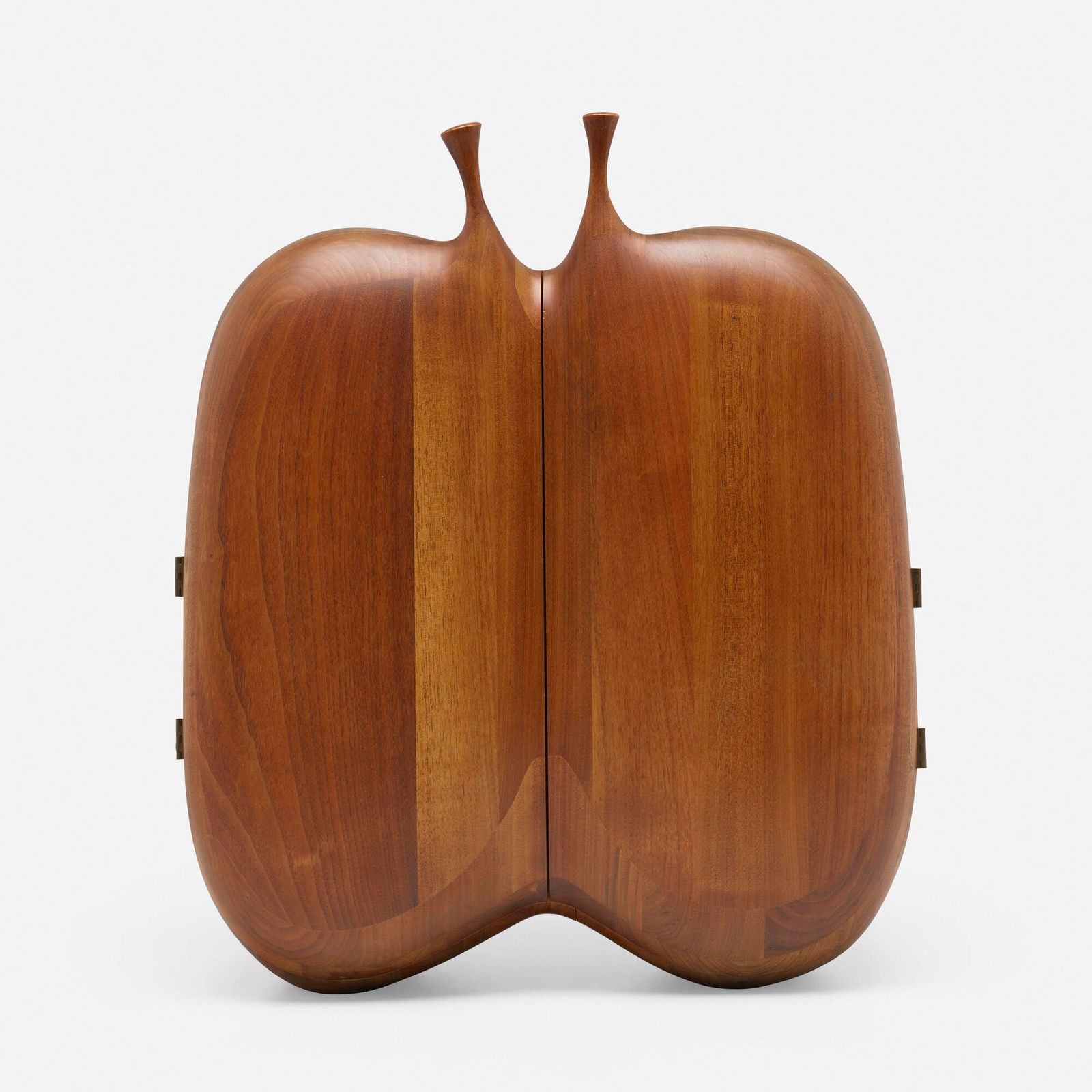 Daniel Loomis Valenza, Tabletop cabinet: Daniel Loomis Valenza Tabletop cabinet USA, c. 1960carved walnut, brass 22 h x 18.75 w x 10 d in (56 x 48 x 25 cm) Cabinet features two doors concealing two compartments and two adjustable she