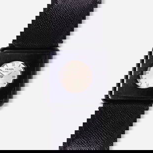 Prada, Watch: Prada Watch Italy Date: c. 1990 Movement: Quartz Case material: Plastic Case size: 45 mm Bracelet/Strap: Leather Clasp/Buckle: Pin buckle