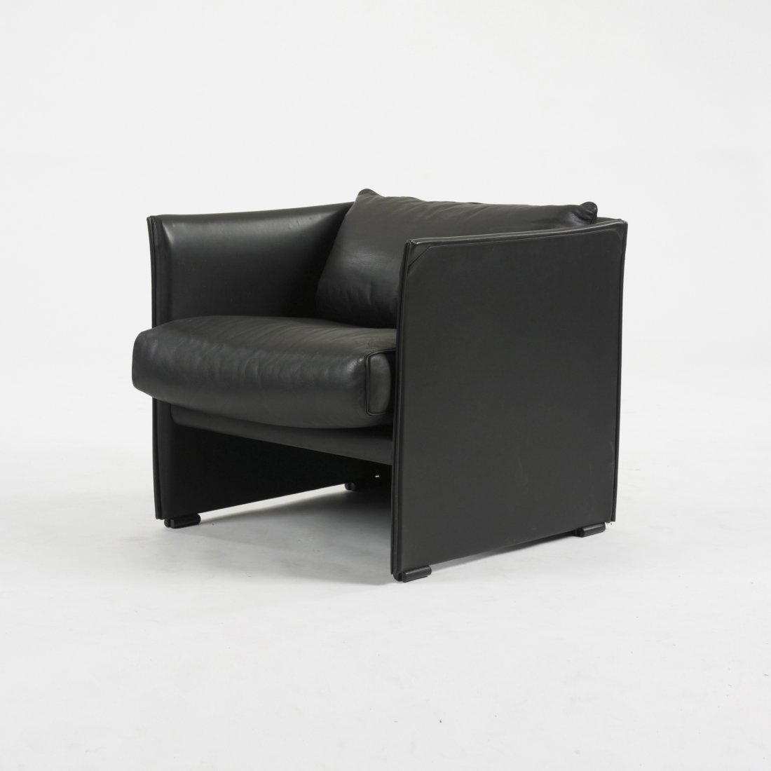 Mario Bellini Break lounge chair: Mario Bellini Break lounge chair Cassina Italy, 1976 leather, plastic 29.5 w x 29.5 d x 26.5 h inches Signed with manufacturer's label to cushion: [Cassina Made in Italy]. Literature: Repertorio 1950-