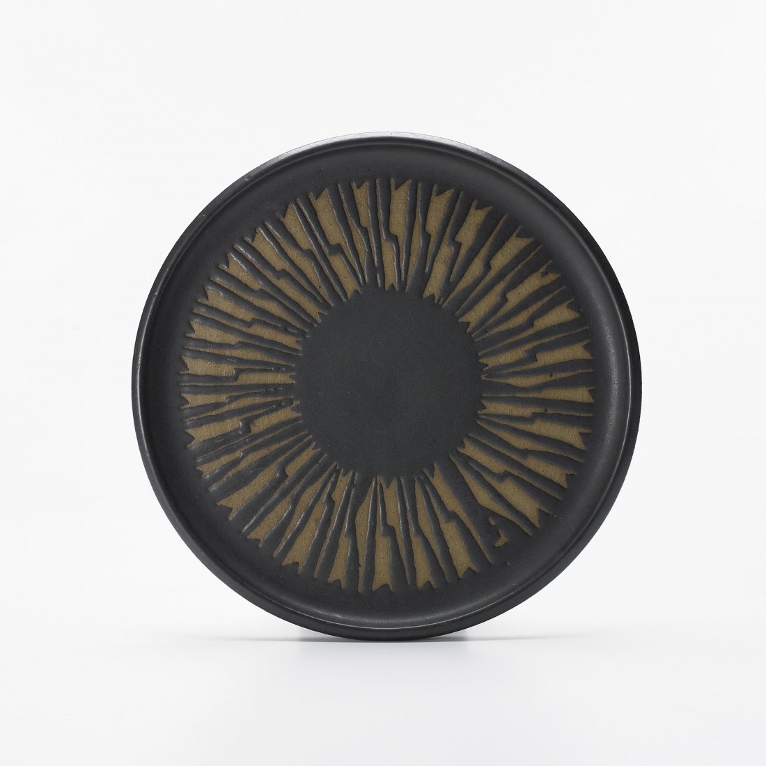Clyde Burt plate: Clyde Burt plate USA, c. 1960 glazed earthenware 11.75 dia x 1 h inches Incised signature to underside: [CB].