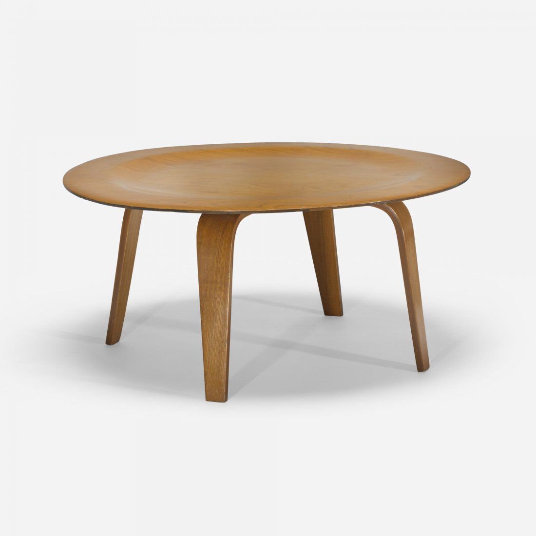 Charles and Ray Eames CTW: Charles and Ray Eames CTW Herman Miller USA, 1945 ash plywood 34.25 dia x 16 h inches Literature: Eames Design: The Work of the Office of Charles and Ray Eames, Neuhart, Neuhart and Eames, ppg. 63, 80