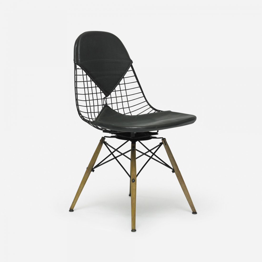 Charles and Ray Eames DKR: Charles and Ray Eames DKR Herman Miller USA, 1951 enameled steel, birch, naugahyde 19 w x 20 d x 32 h inches Literature: Eames Design: The Work of the Office of Charles and Ray Eames, Neuhart, Neuhart
