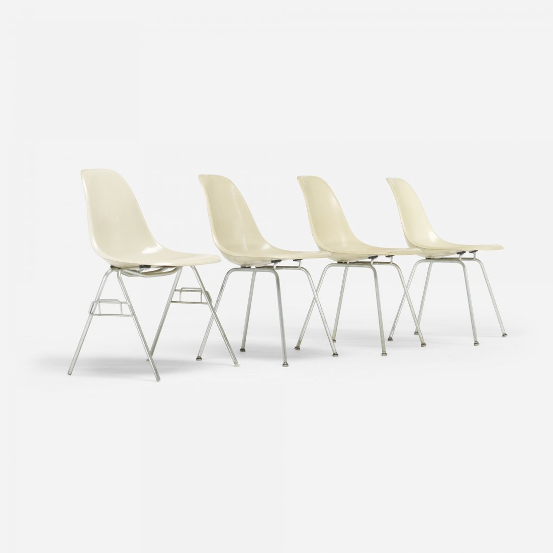 Charles and Ray Eames DSS and set of three DSXs: Charles and Ray Eames DSS and set of three DSXs Herman Miller USA, 1950/c. 1970 molded fiberglass, steel, rubber 18.5 w x 21.5 d x 31.5 h inches Signed with molded manufacturer's mark to underside of 
