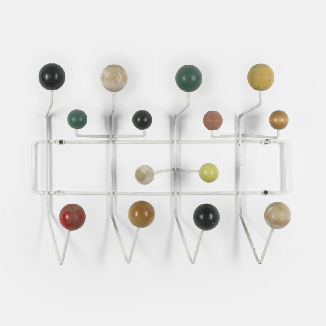 Charles and Ray Eames Hang-It-All: Charles and Ray Eames Hang-It-All Tigrett Enterprises USA, 1953 enameled wood, enameled steel 20 w x 6 d x 5 h inches Literature: Eames Design: The Work of the Office of Charles and Ray Eames, Neuhart