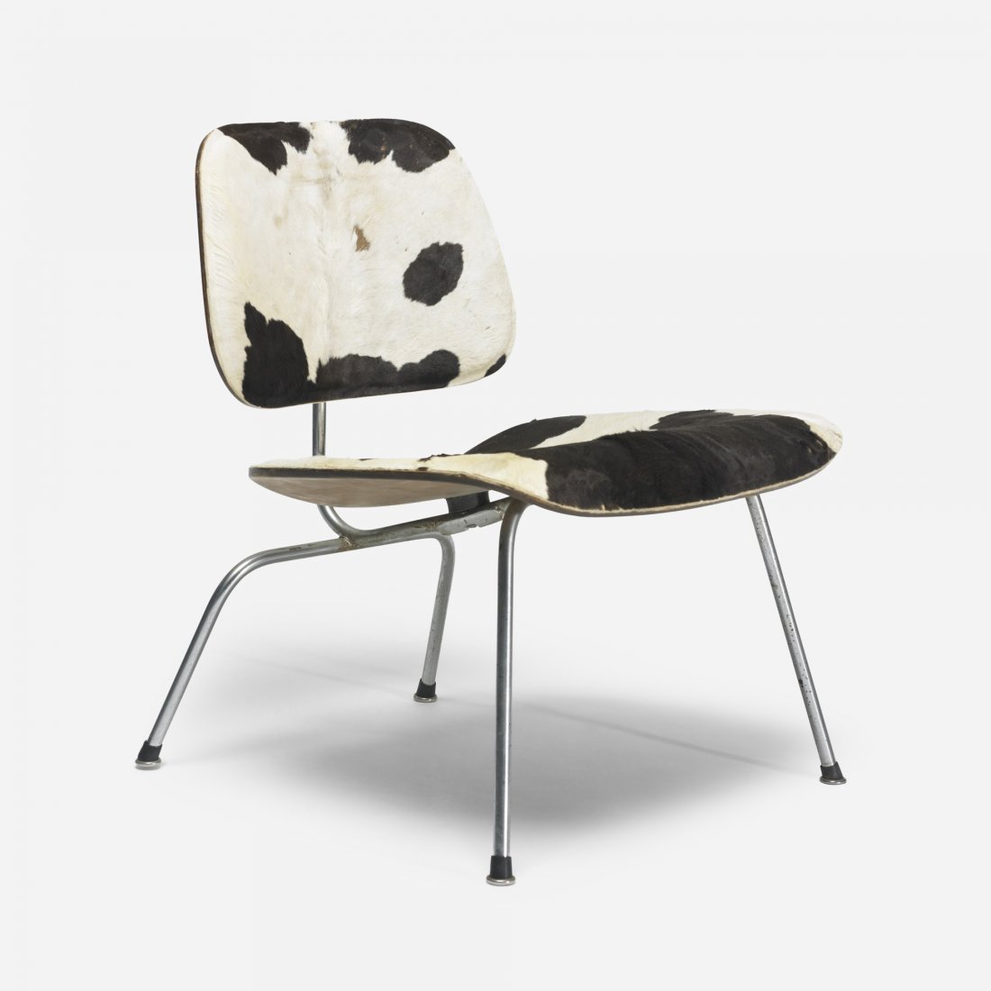Charles and Ray Eames LCM: Charles and Ray Eames LCM Herman Miller USA, 1946/c. 1952 cowhide, ash plywood, chrome-plated steel, rubber 22.5 w x 24 d x 26 h inches Literature: Eames Design: The Work of the Office of Charles and 