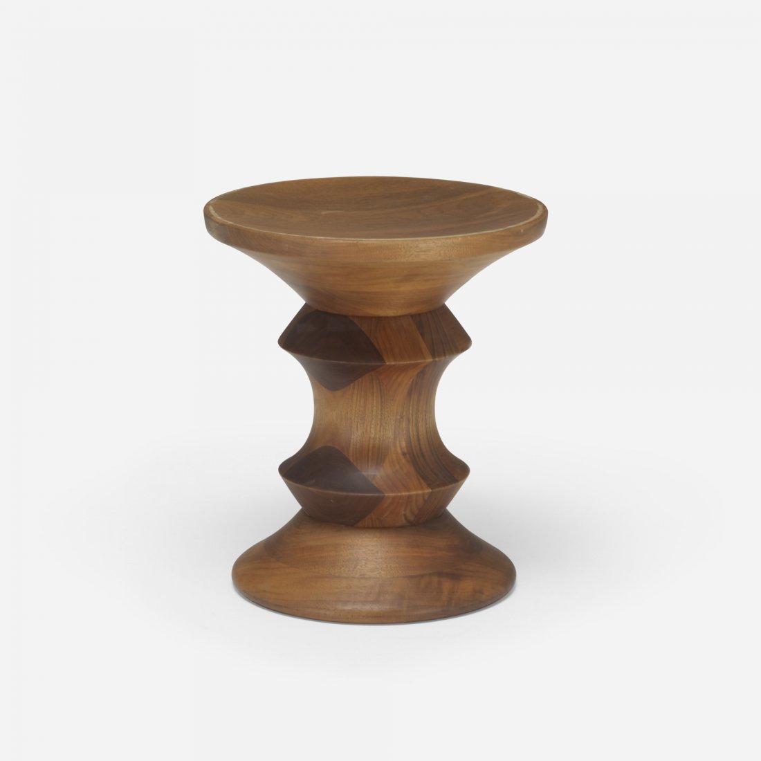 Charles and Ray Eames Time Life stool: Charles and Ray Eames Time Life stool Herman Miller USA, 1960 walnut 13 dia x 15 h inches Literature: Eames Design: The Work of the Office of Charles and Ray Eames, Neuhart, Neuhart and Eames, ppg. 24