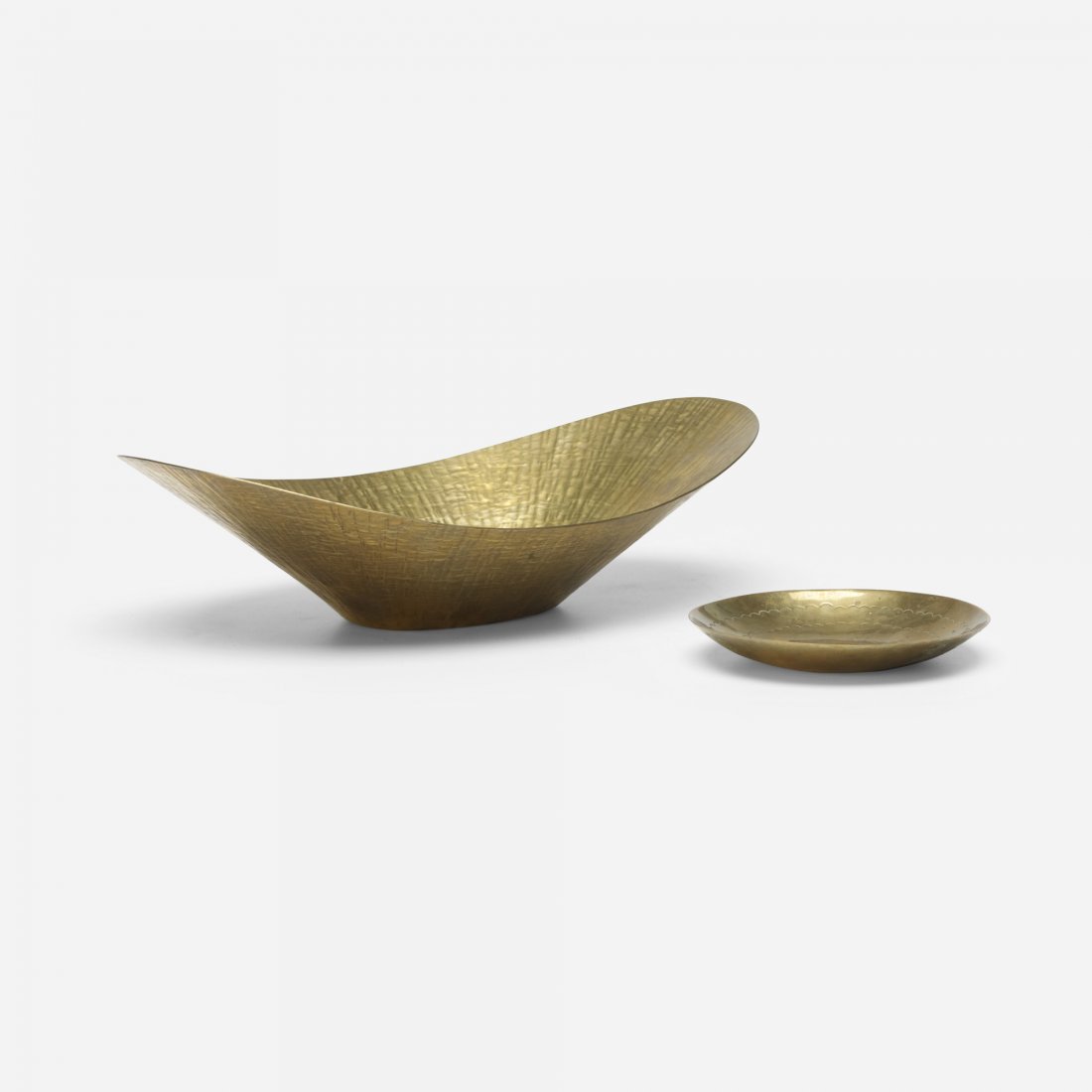 Hayno Focken bowls, pair: Hayno Focken bowls, pair Germany, c. 1935 brass 11 w x 7 d x 3 h inches Additional bowl measures: 4.5 dia x .75 h inches. Signed with impressed manufacturer's mark to one example: [HH] and signed with