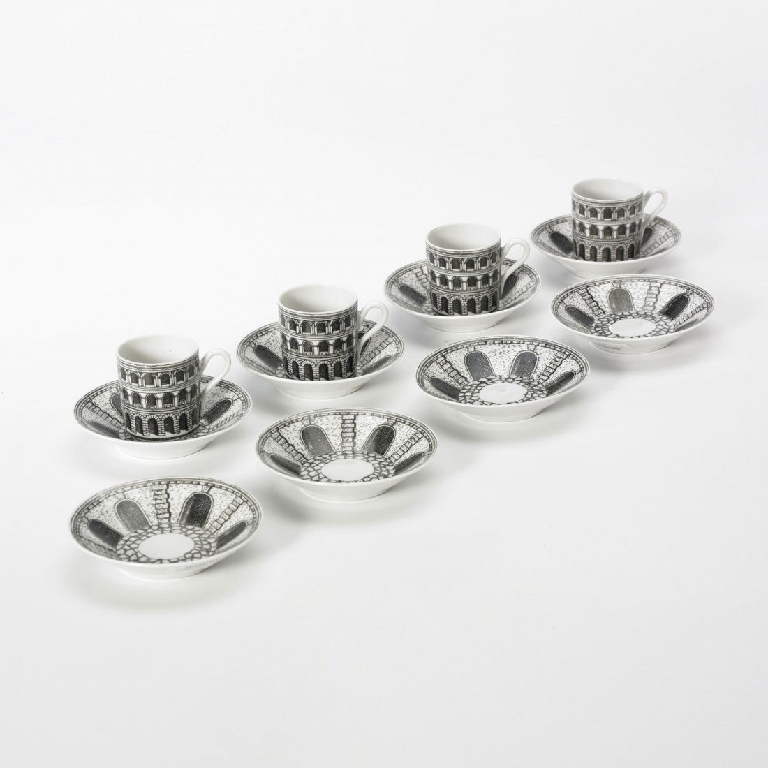 Piero Fornasetti Architettura espresso set: Piero Fornasetti Architettura espresso set Fornasetti Milano Italy, c. 1950/c. 1980 transfer-printed porcelain 4.25 dia x 2.5 h inches Set includes four espresso cups and eight saucers. Signed with pr