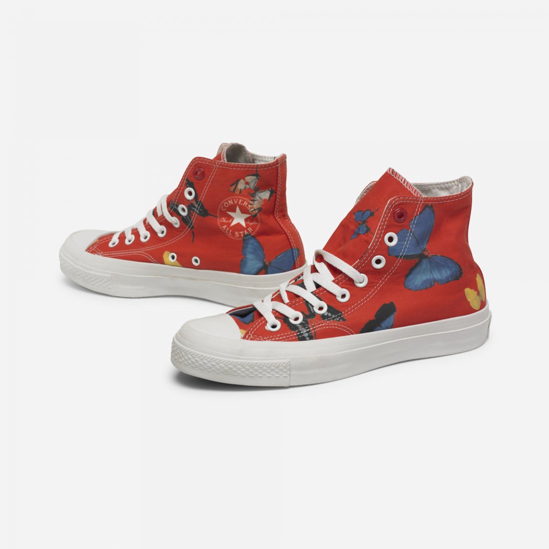 Damien Hirst Chuck Taylor All Star Shoes: Damien Hirst Chuck Taylor All Star Shoes Converse United Kingdom, 2010 tranfer-printed canvas, rubber 4 w x 10.75 d x 5.5 h inches Size 6.5. This pair of shoes is from the edition of 400. Signed with 