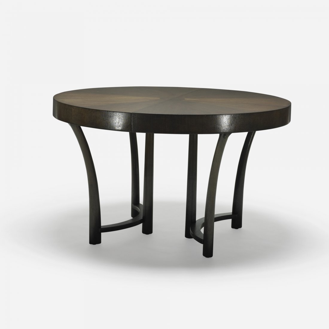T.H. Robsjohn-Gibbings dining table: T.H. Robsjohn-Gibbings dining table Widdicomb United Kingdom, 1950 lacquered mahogany 48.25 dia x 28.75 h inches Sold with two 12-inch leaves; table measures seventy-two inches when fully extended. Si