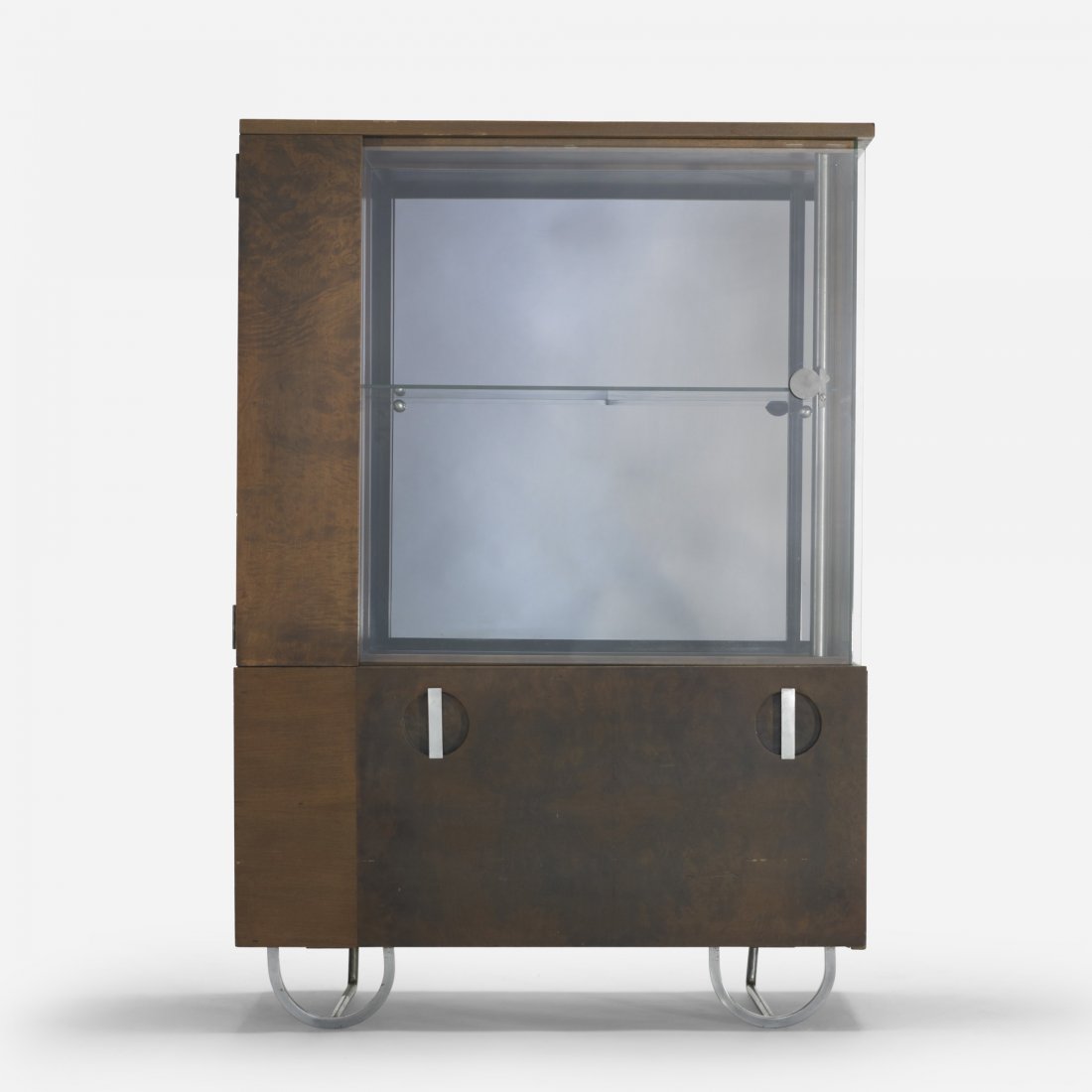 Gilbert Rohde China cabinet, model 3321: Gilbert Rohde China cabinet, model 3321 Herman Miller USA, 1933 walnut, burl walnut, glass, nickel-plated brass, steel 35.75 w x 14 d x 52 h inches Literature: Gilbert Rohde: Modern Design for Modern