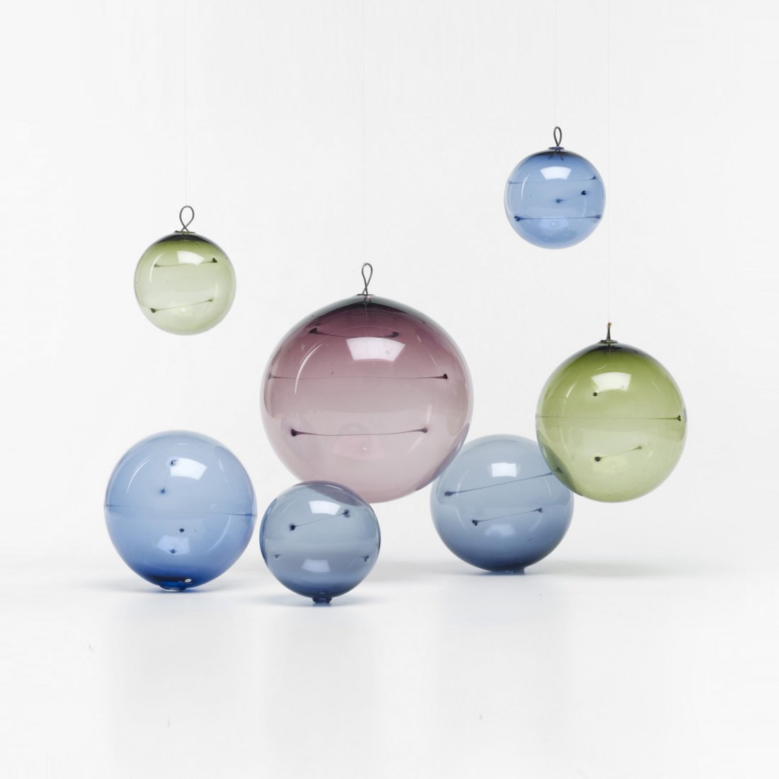 Timo Sarpaneva Sunballs, set of seven: Timo Sarpaneva Sunballs, set of seven Iittala Finland, 1960 hand-blown glass 8 dia Incised signature to each element [TS] or [Timo Sarpaneva]. Literature: Timo Sarpaneva: Kokoelma Collection, Aav et.