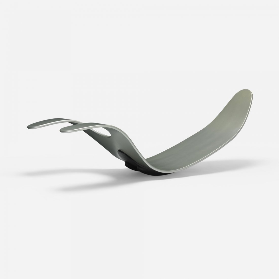 Scandinavian chaise lounge: Scandinavian chaise lounge Sweden, c. 1970 bent plywood 23.5 w x 57 d x 13 h inches