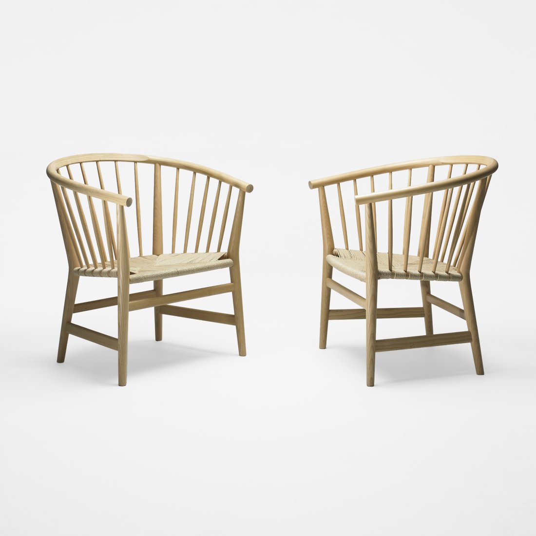 Hans Wegner armchairs, pair: Hans Wegner armchairs, pair PP Mobler Denmark, 1978 ash, paper cord 28 w x 24 d x 30 h inches Signed with applied manufacturer's label to underside of each example: [PP Mobler Danmark Design: Hans J.
