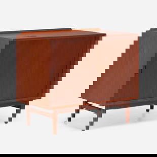 Arne Vodder, Record cabinet: Arne Vodder Record cabinet Sibast MoblerDenmark, c. 1960teak 30.5 h x 35.75 w x 19.5 d in (77 x 91 x 50 cm) Cabinet features a hinged lid top over one tambour door concealing three stora