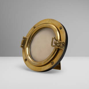 Asprey & Co., Porthole picture frame: Asprey & Co. Porthole picture frame United Kingdom, c. 1930 brass, leather, glass 5.75 h x 6 w x 3.25 d in (15 x 15 x 8 cm) Impressed manufacturer's mark to reverse 'Asprey'. This work will ship