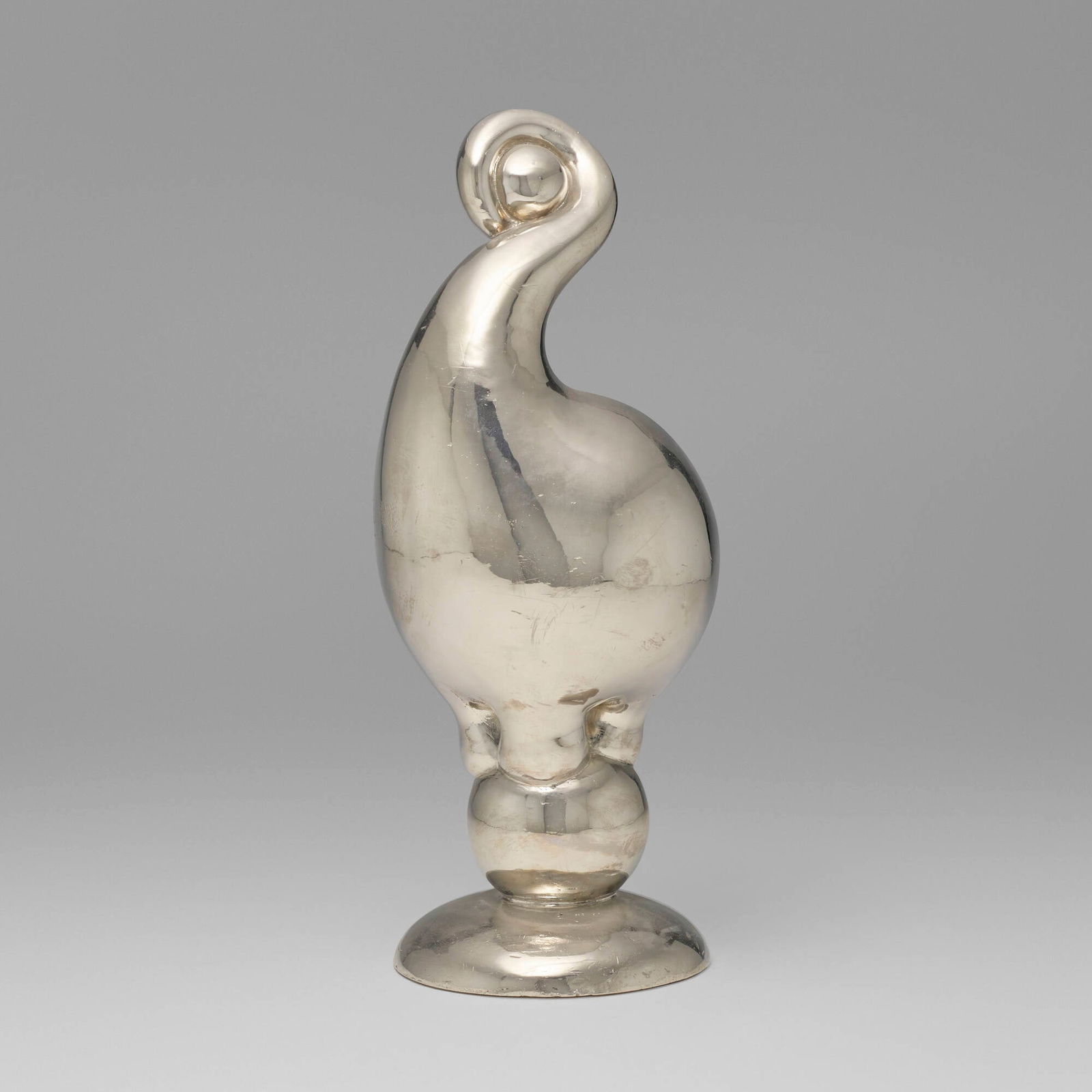 Russel Wright, Hokus doorstop: Russel Wright Hokus doorstop Russel Wright, Inc.USA, c. 1930nickel-plated metal 12 h x 4.5 dia in (30 x 11 cm) Literature: Collector's Encyclopedia of Russel Wright,