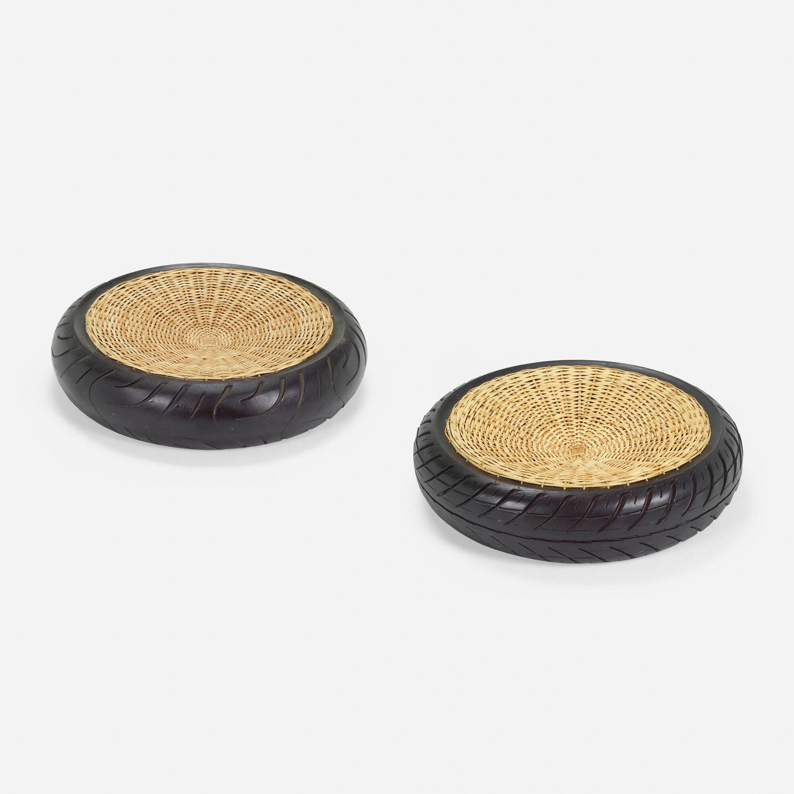 Fernando and Humberto Campana, TransNeomatic centerpieces, pair: Fernando and Humberto Campana TransNeomatic centerpieces, pair ArtecnicaBrazil / USA, 2007repurposed scooter tire, wicker, bamboo, hand-woven hemp 4 h x 15.5 dia in (10 x 39 cm) Printed