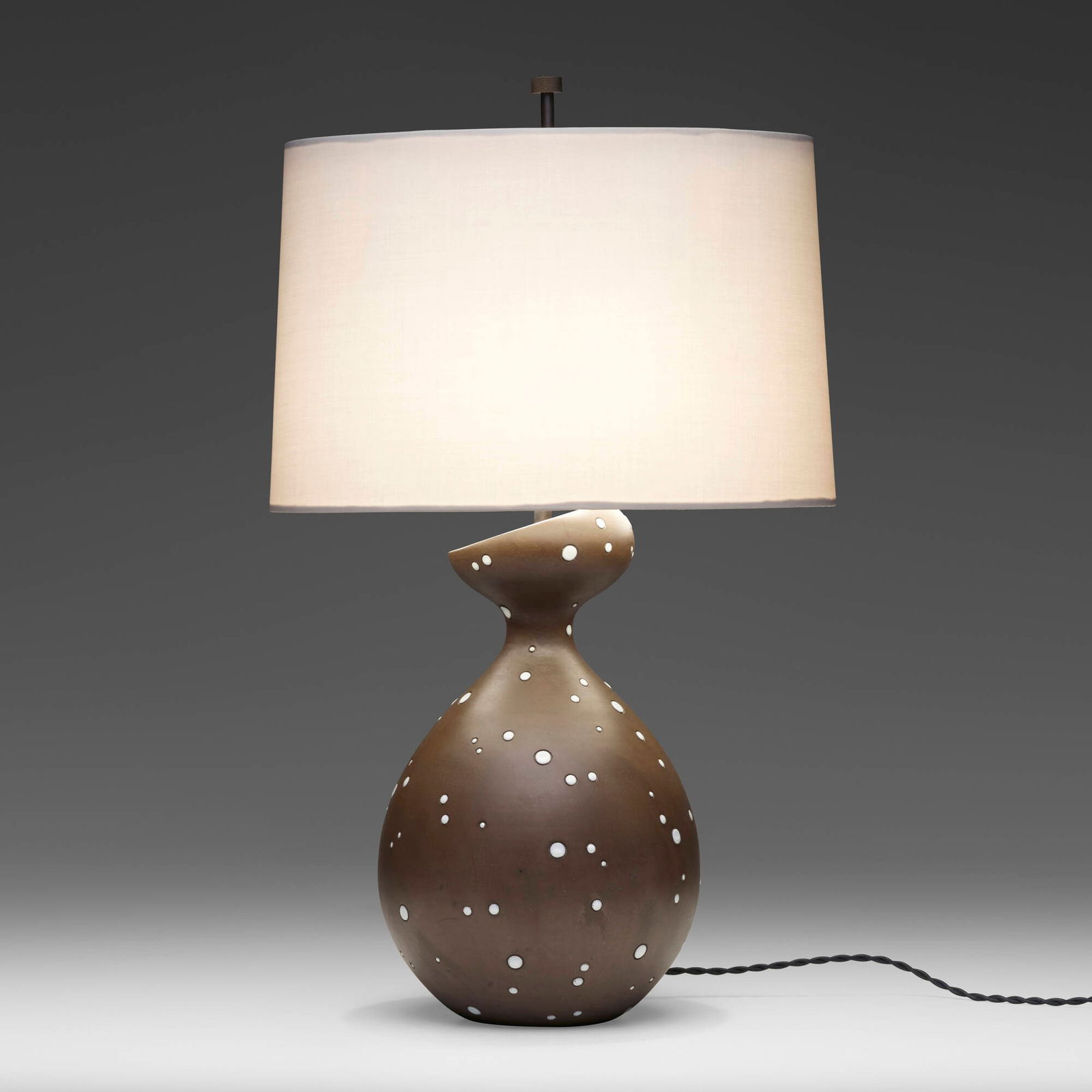 Italian, Table lamp: Italian Table lamp 1978glazed stoneware, metal, linen shade 27 h x 9.5 dia in (69 x 24 cm) Glazed distributor's mark to underside 'Italy 1978 Raymor'. This work will ship f