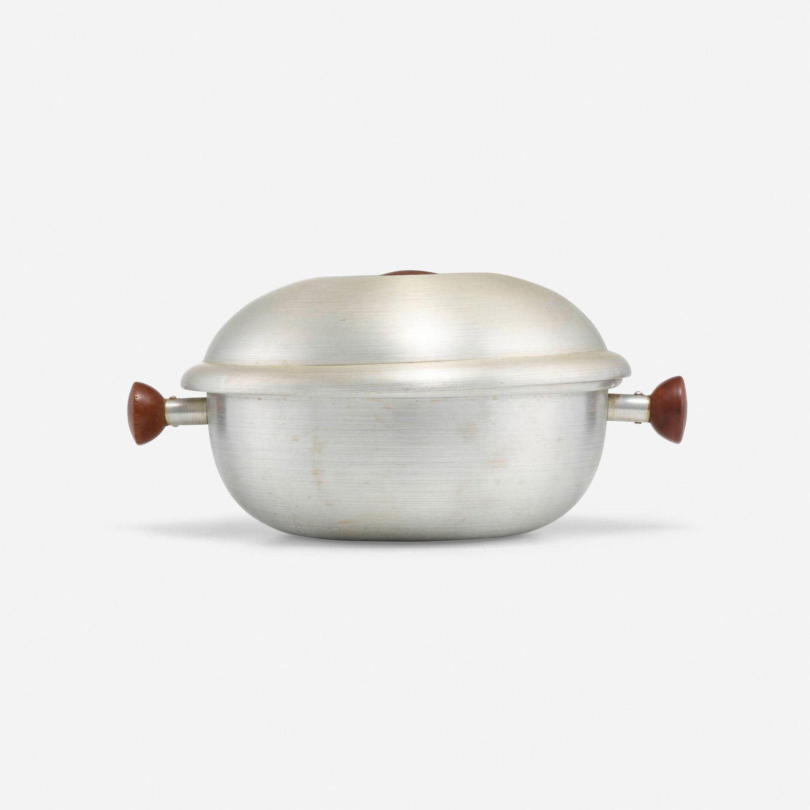 Russel Wright, Lidded serving bowl: Russel Wright Lidded serving bowl USA, c. 1935spun aluminum, wood 5.5 h x 11.5 w x 9.25 d in (14 x 29 x 23 cm) Impressed manufacturer's mark to underside 'Russel Wright'. T