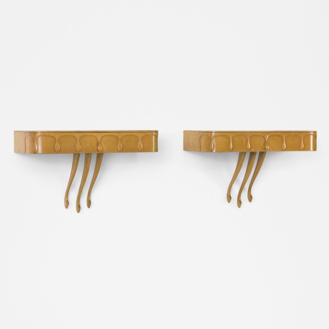 Osvaldo Borsani wall-mounted nightstands, pair: Osvaldo Borsani wall-mounted nightstands, pair Italy, c. 1945 pear wood 25.5 w x 12.5 d x 15.75 h inches Each nightstand features a single drawer.