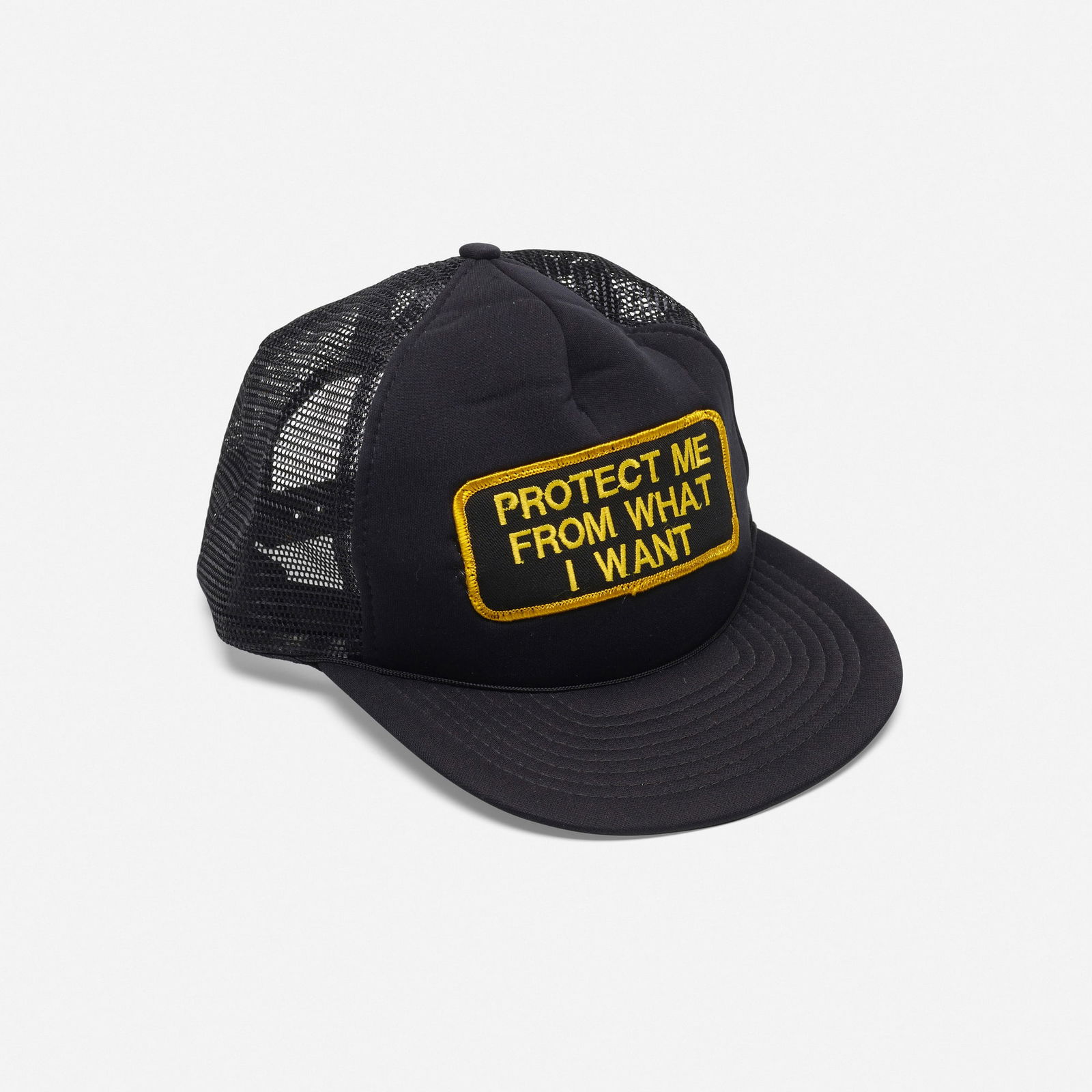Jenny Holzer, Protect Me From What I Want (Trucker Hat) (from the Survival series): Jenny Holzer Protect Me From What I Want (Trucker Hat) (from the Survival series) 1983-85polyester, embroidery 5.5 h x 8.5 w x 10.5 d in (14 x 22 x 27 cm) This work will ship from
