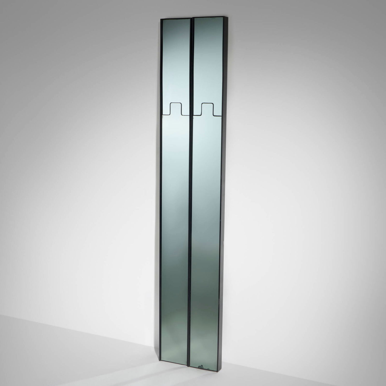 Luciano Bertoncini, Gronda mirror and coat racks, pair: Luciano Bertoncini Gronda mirror and coat racks, pair ElcoItaly, c. 1975smoked mirrored glass, plastic 79.75 h x 7.5 w x 2.375 d in (203 x 19 x 6 cm) This work will ship fro