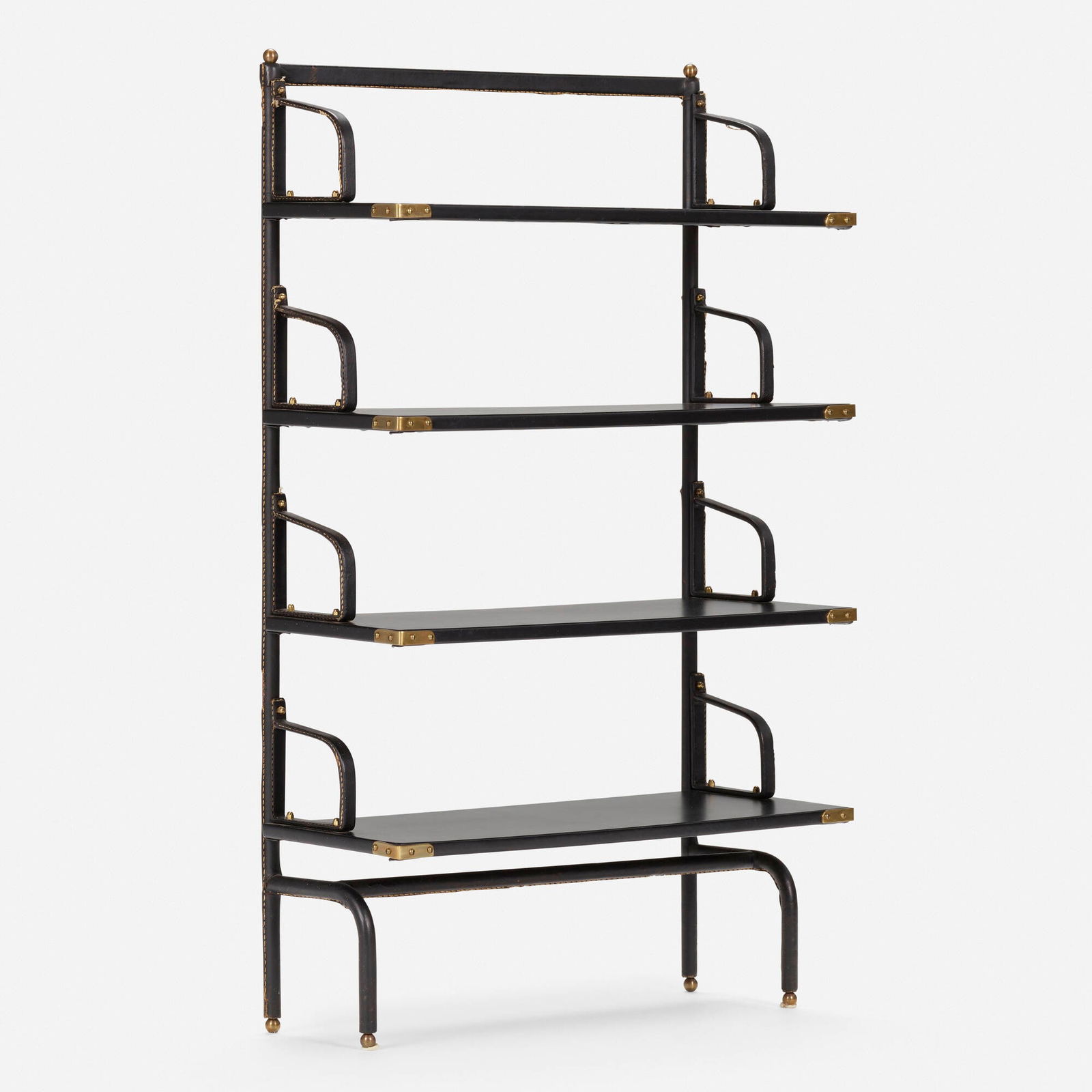 Jacques Adnet, attribution, Bookcase: Jacques Adnet, attribution Bookcase France, c. 1950saddle-stitched leather over steel, brass, leatherette over wood 43.5 h x 26.5 w x 11.25 d in (110 x 67 x 29 cm) This work will