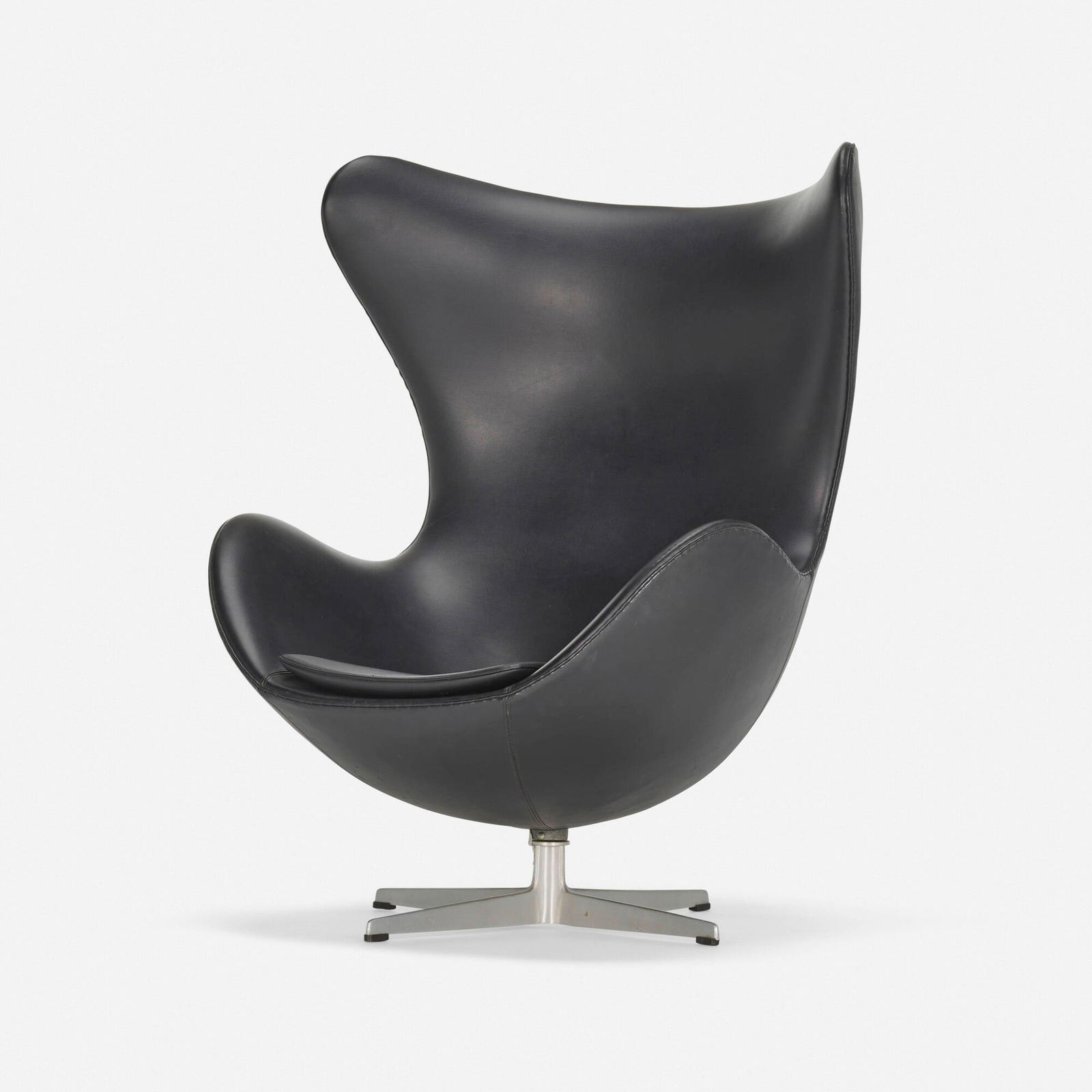 Arne Jacobsen, Egg chair: Arne Jacobsen Egg chair Fritz HansenDenmark, 1958leatherette, cast aluminum, molded fiberglass, foam, steel 41.5 h x 33.75 w x 31 d in (105 x 86 x 79 cm) Provenance: Los