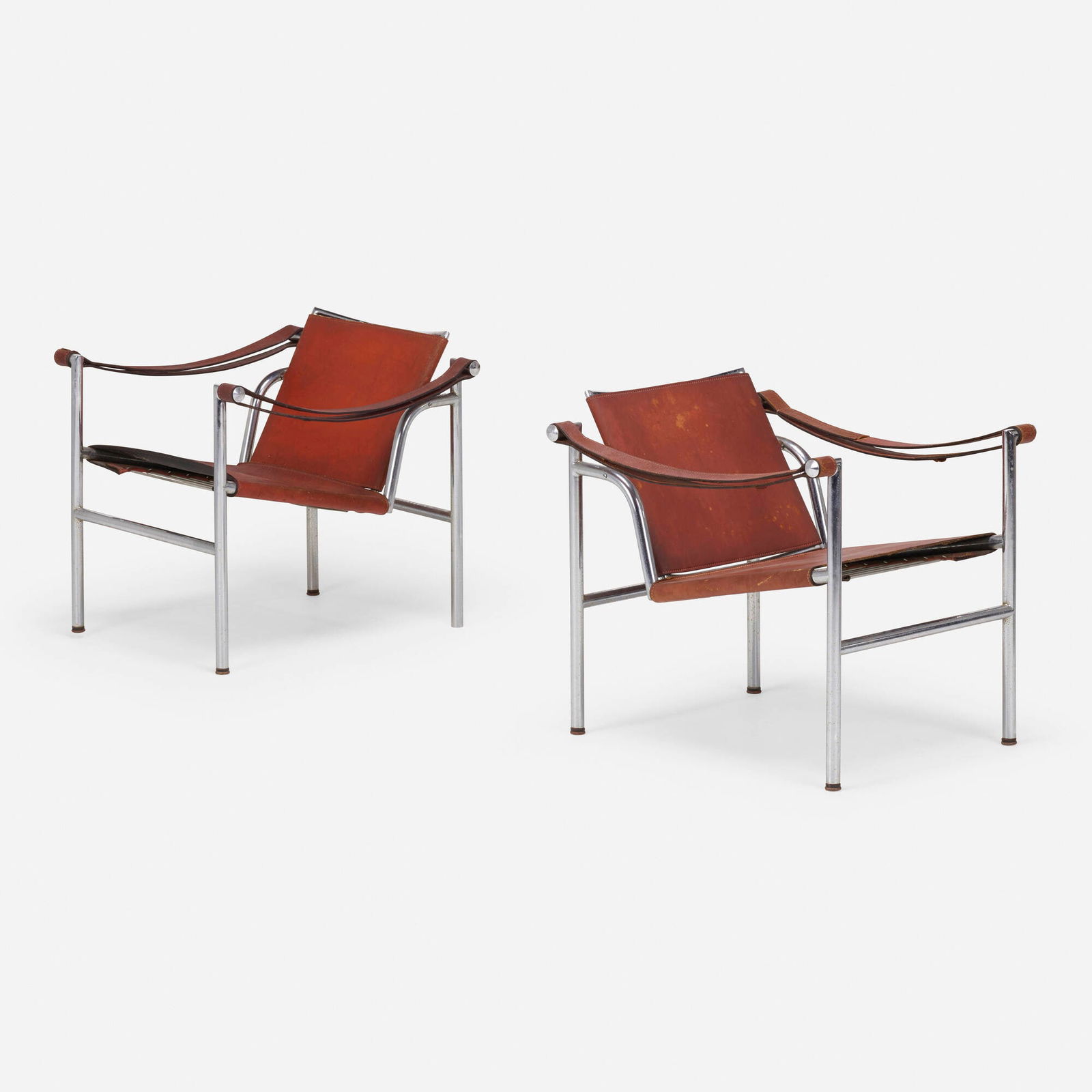 Charlotte Perriand, Pierre Jeanneret and Le Corbusier, Basculant chairs model LC1, pair: Charlotte Perriand, Pierre Jeanneret and Le Corbusier Basculant chairs model LC1, pair CassinaFrance / Italy, 1929 / c. 1970chrome-plated steel, leather 25.5 h x 23.25 w x 25.25 d in (65 x 59 x