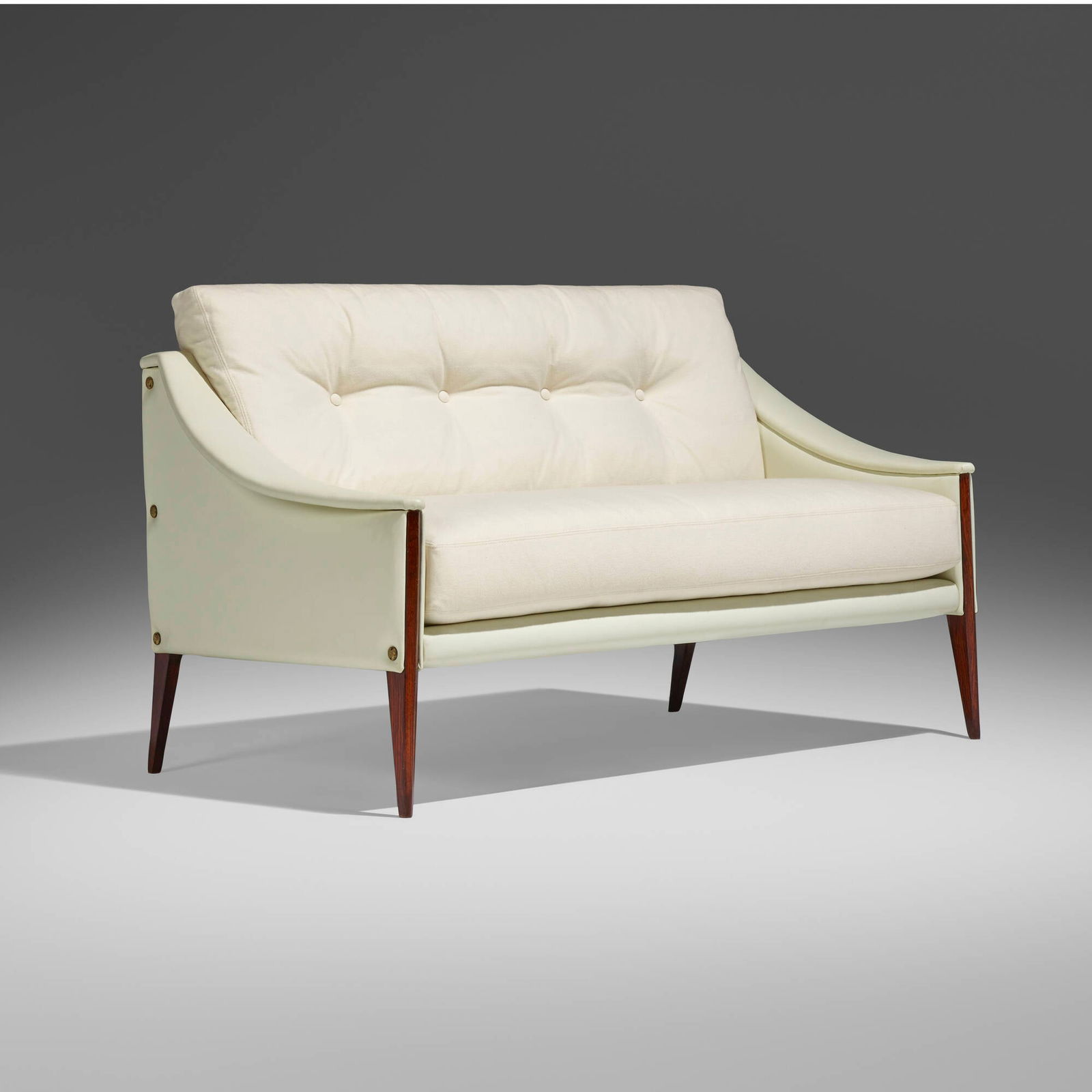 Gio Ponti, Dezza settee, model 24: Gio Ponti Dezza settee, model 24 Poltrona FrauItaly, 1966upholstery, leather, rosewood, brass 32 h x 54 w x 30.5 d in (81 x 137 x 77 cm) Literature: Gio Ponti: l'arte
