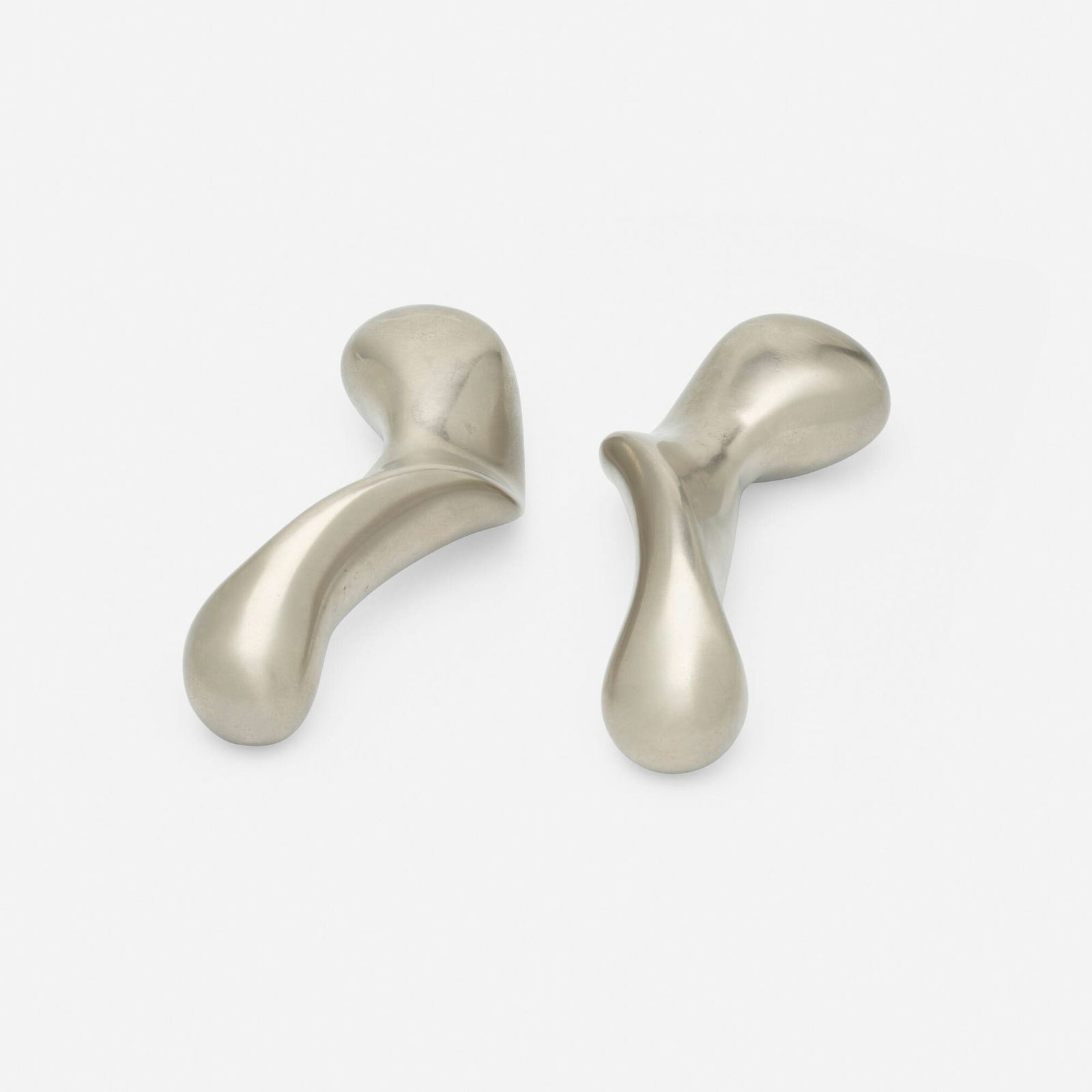 Philippe Starck, Pair of POAA Dumbbells: Philippe Starck Pair of POAA Dumbbells XOFrance, 1999stainless steel 2.75 h x 8 w x 3.75 d in (7 x 20 x 10 cm) 2.875 h x 7.875 w x 3.625 d in (7 x 20 x 9 cm) These works were made for