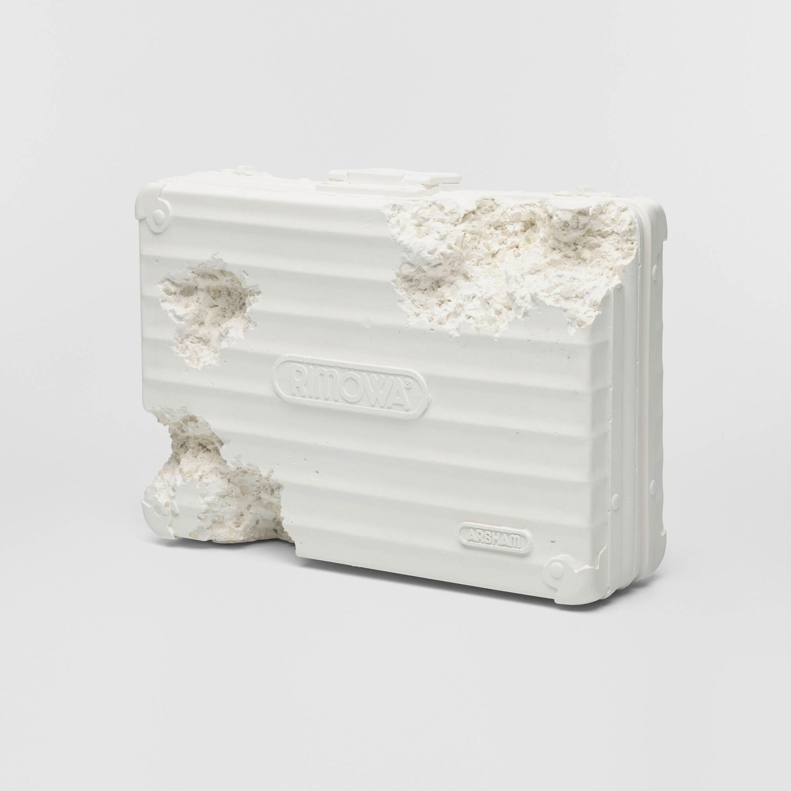 Daniel Arsham, Eroded Attache: Daniel Arsham Eroded Attache USA, 2019cast plaster, aluminum 15 h x 17.75 w x 5.5 d in (38 x 45 x 14 cm) Incised manufacturer's mark to upper edge of aluminum briefcase 'Rimowa Arsham Studio D