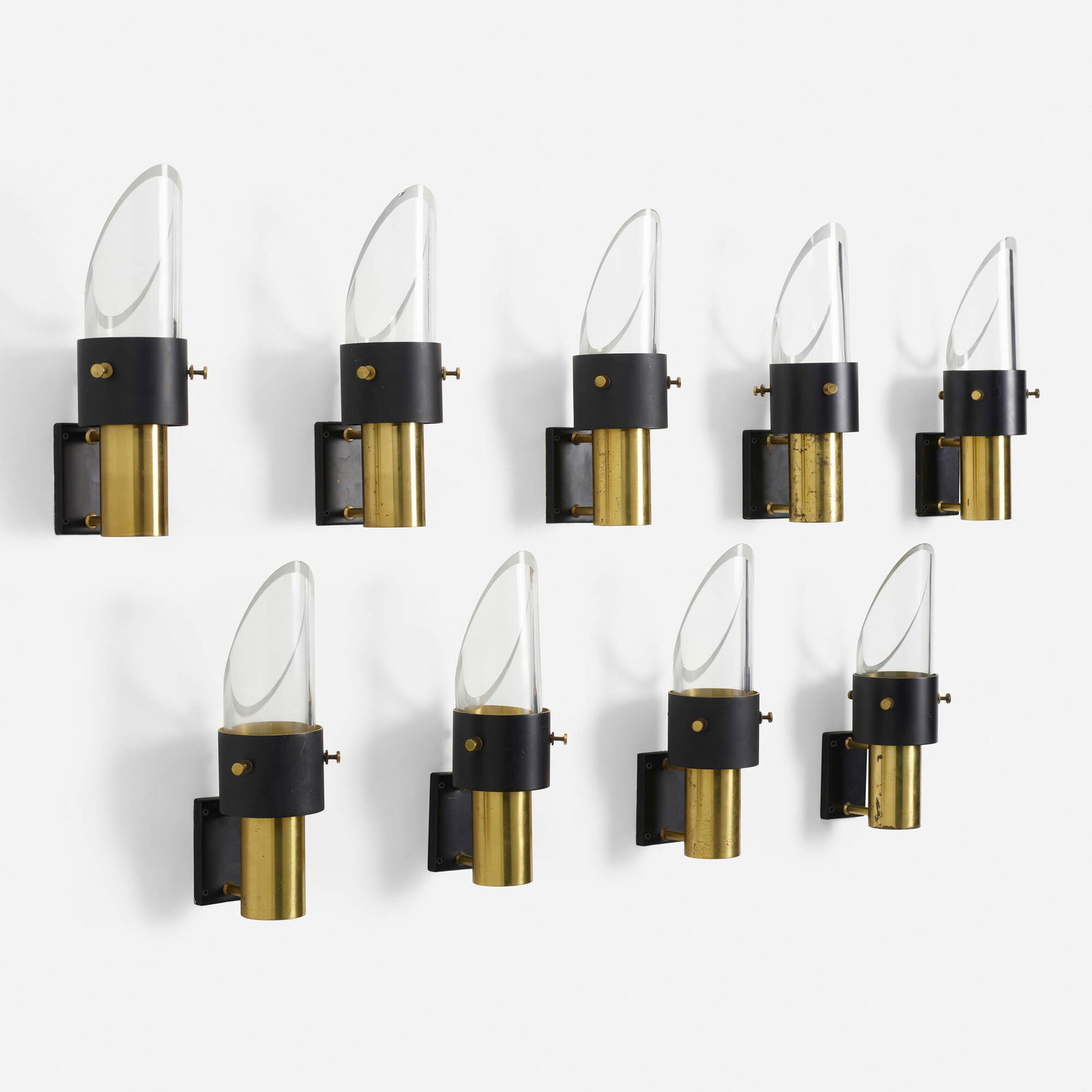 Kai Korbing, Sconces, set of nine: Kai Korbing Sconces, set of nine LyfaDenmark, c. 1960brass, lacquered brass, glass 14.5 h x 4.5 w x 5.5 d in (37 x 11 x 14 cm) Paper manufacturer's label to reverse of one example 'Lyfa'