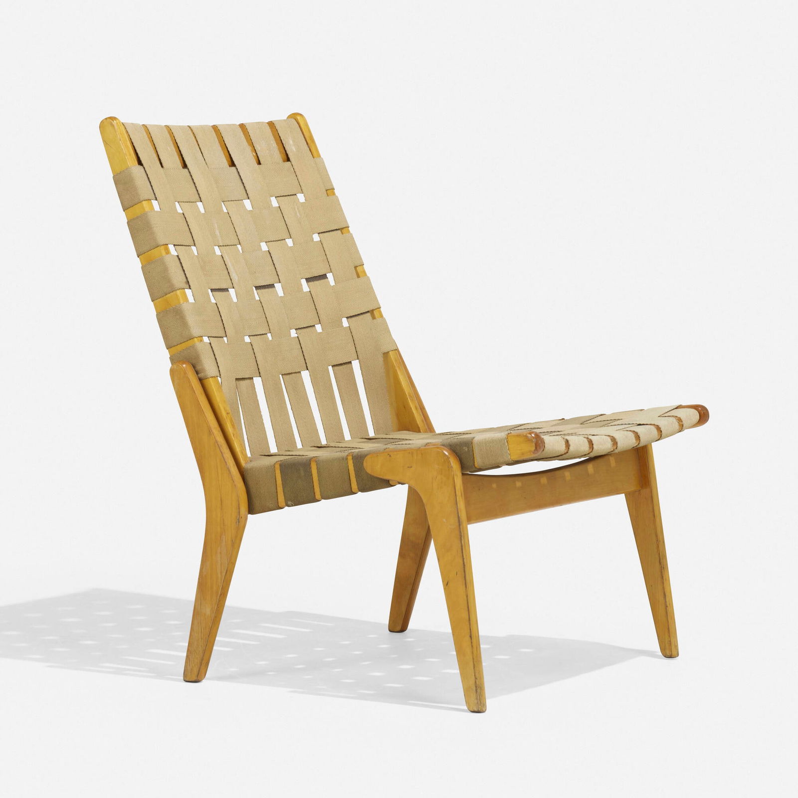 Ilmari Tapiovaara, Colette lounge chair: Ilmari Tapiovaara Colette lounge chair AskoFinland, 1954birch, webbing 30 h x 21.5 w x 26.5 d in (76 x 55 x 67 cm) Provenance: Acquired in 2000 by the present owner <