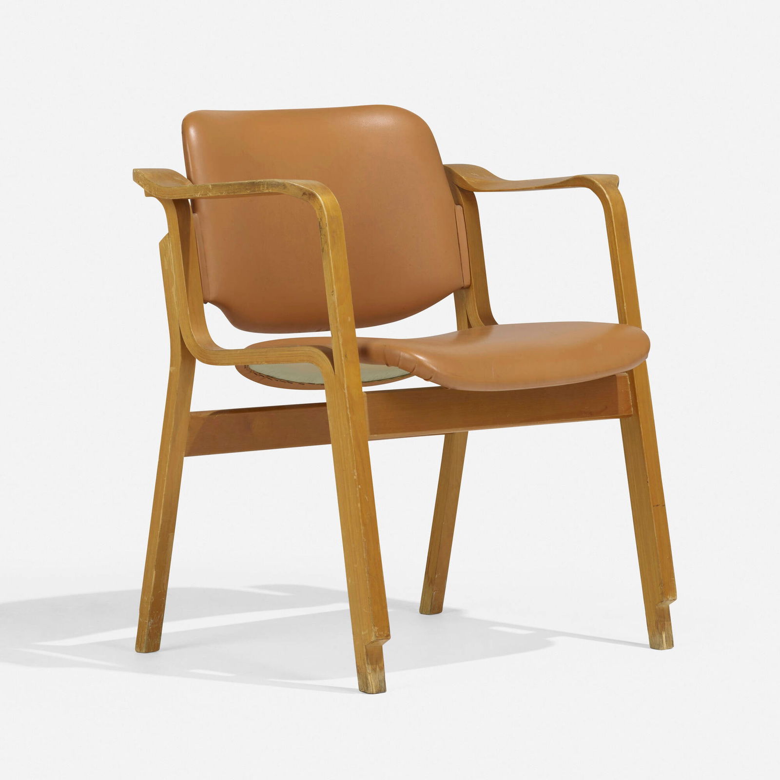 Ilmari Tapiovaara, Wilhelmina II armchair: Ilmari Tapiovaara Wilhelmina II armchair Wilh. Schauman Ltd.Finland, 1969laminated birch, vinyl upholstery 30 h x 18.5 w x 26.5 d in (76 x 47 x 67 cm) Provenance: Collec