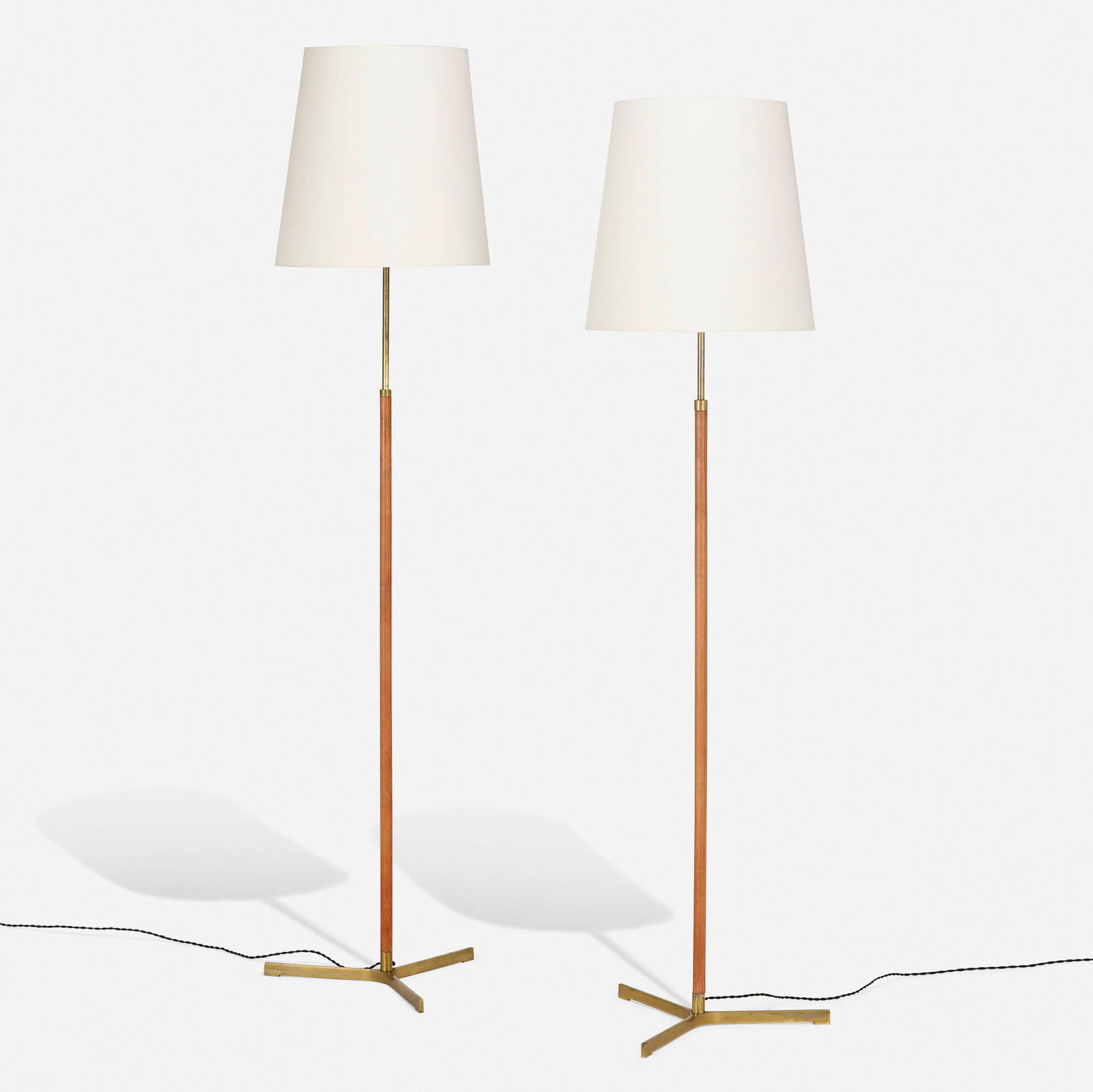 Jo Hammerborg, Floor lamps, pair: Jo Hammerborg Floor lamps, pair Fog & MorupDenmark, c. 1950brass, linen, leather 60 h x 15.75 dia in (152 x 40 cm) This work will ship from Chicago, Illinois.