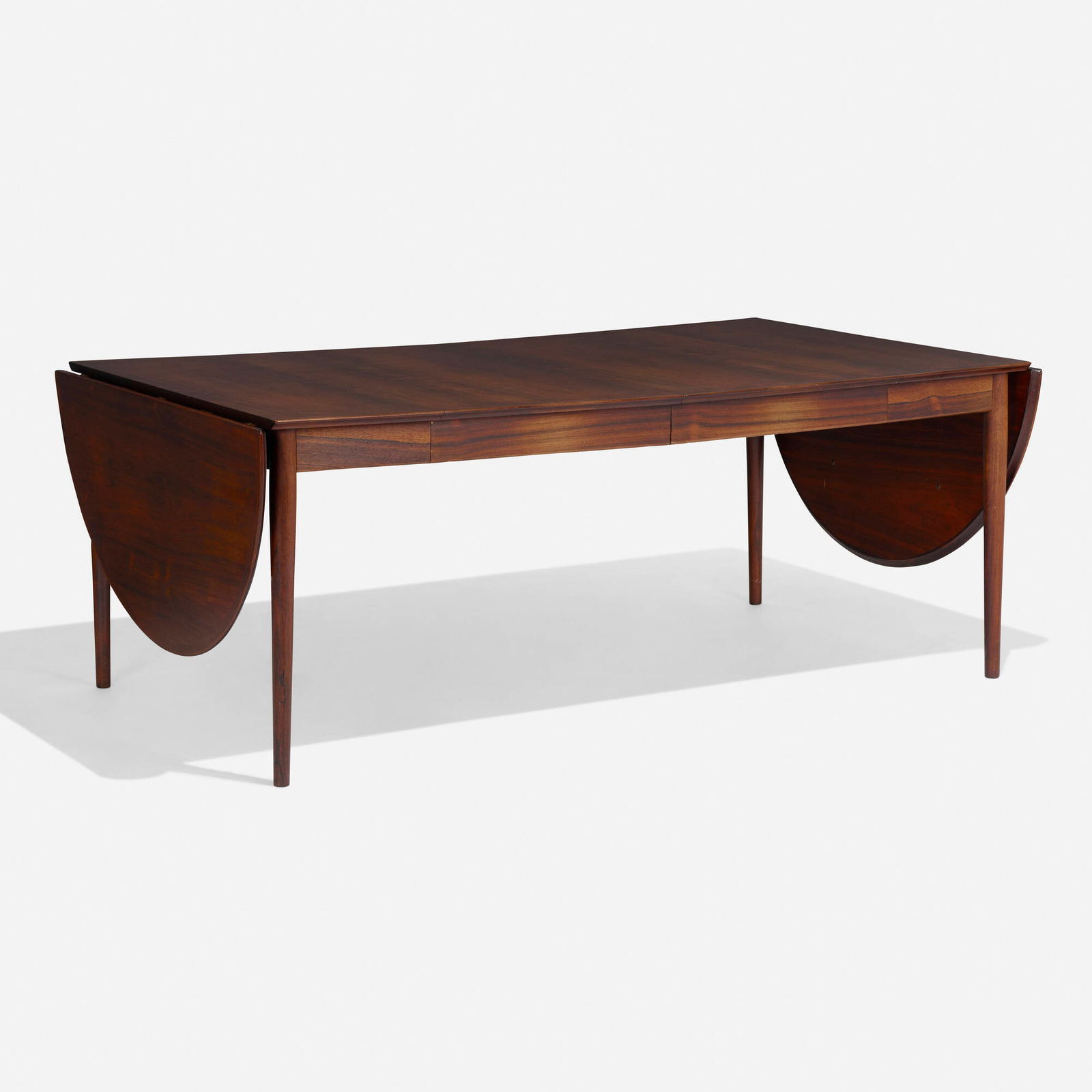 Arne Vodder, Dining table, model 227: Arne Vodder Dining table, model 227 Sibast MoblerDenmark, c. 1960rosewood, brass 28.5 h x 75 w x 41.75 d in (72 x 190 x 106 cm) Sold with two 22-inch leaves and two 20.75-inch drop-leave
