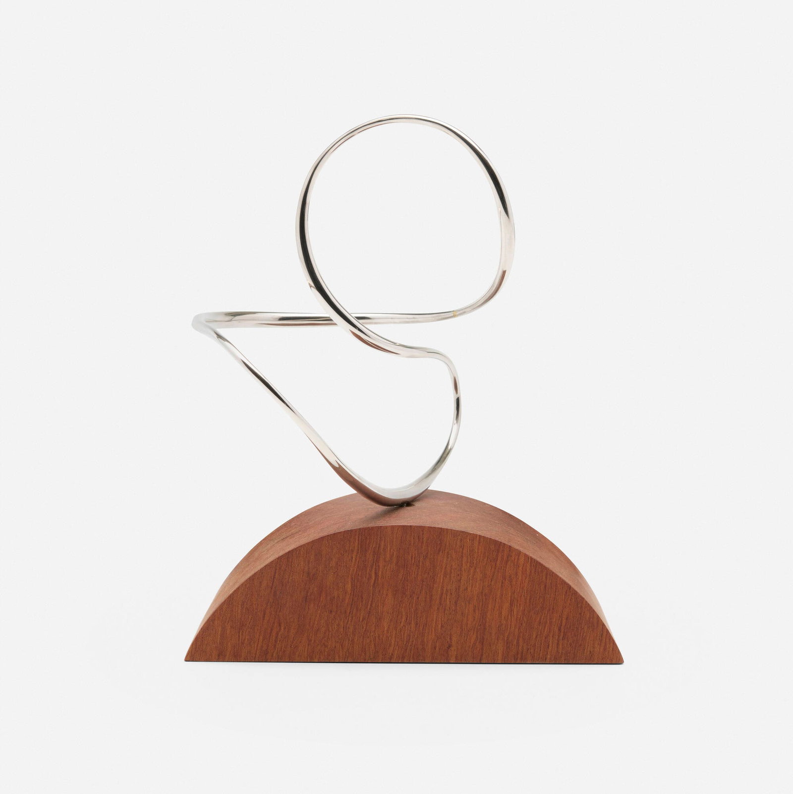 Jose de Rivera, Construction 6-52: Jose de Rivera Construction 6-52 1952 stainless steel, mahogany 8.75 h x 7 w x 6 d in (22 x 18 x 15 cm) Impressed signature and date to underside 'Jose de Rivera 52'. Provenance: