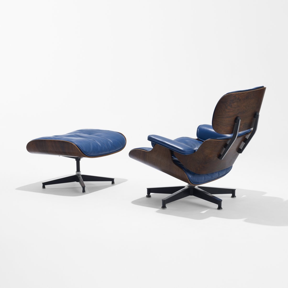 Eames special 670 lounge chair and 671 ottomon: Charles and Ray Eames special-order 670 lounge chair and 671 ottomon Herman Miller USA, 1956/c. 1960 rosewood plywood, leather, enameled aluminum, rubber 33 w x 35 d x 31.5 h inches Ottoman measures: 